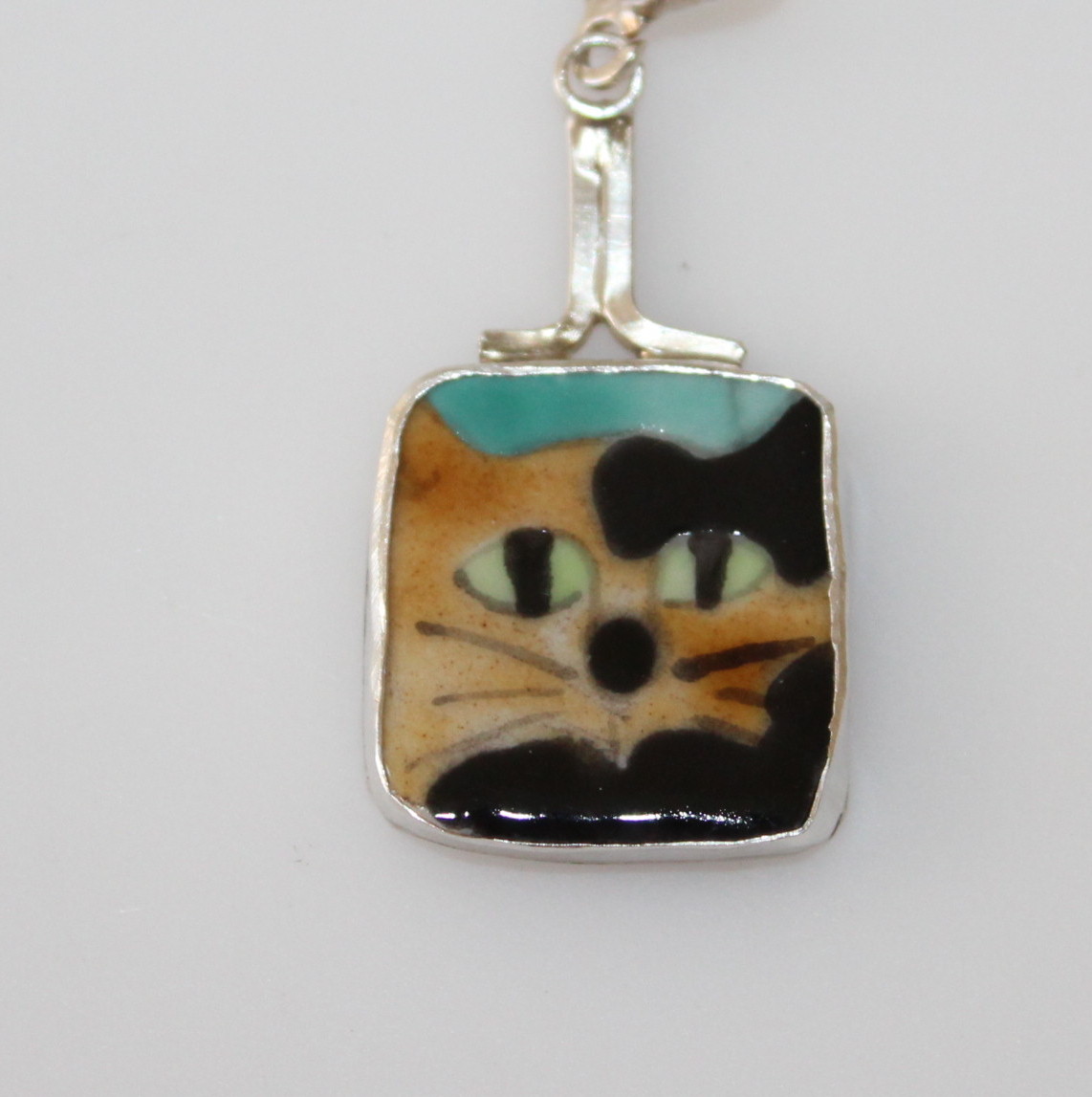 Sterling and Tile Pendants