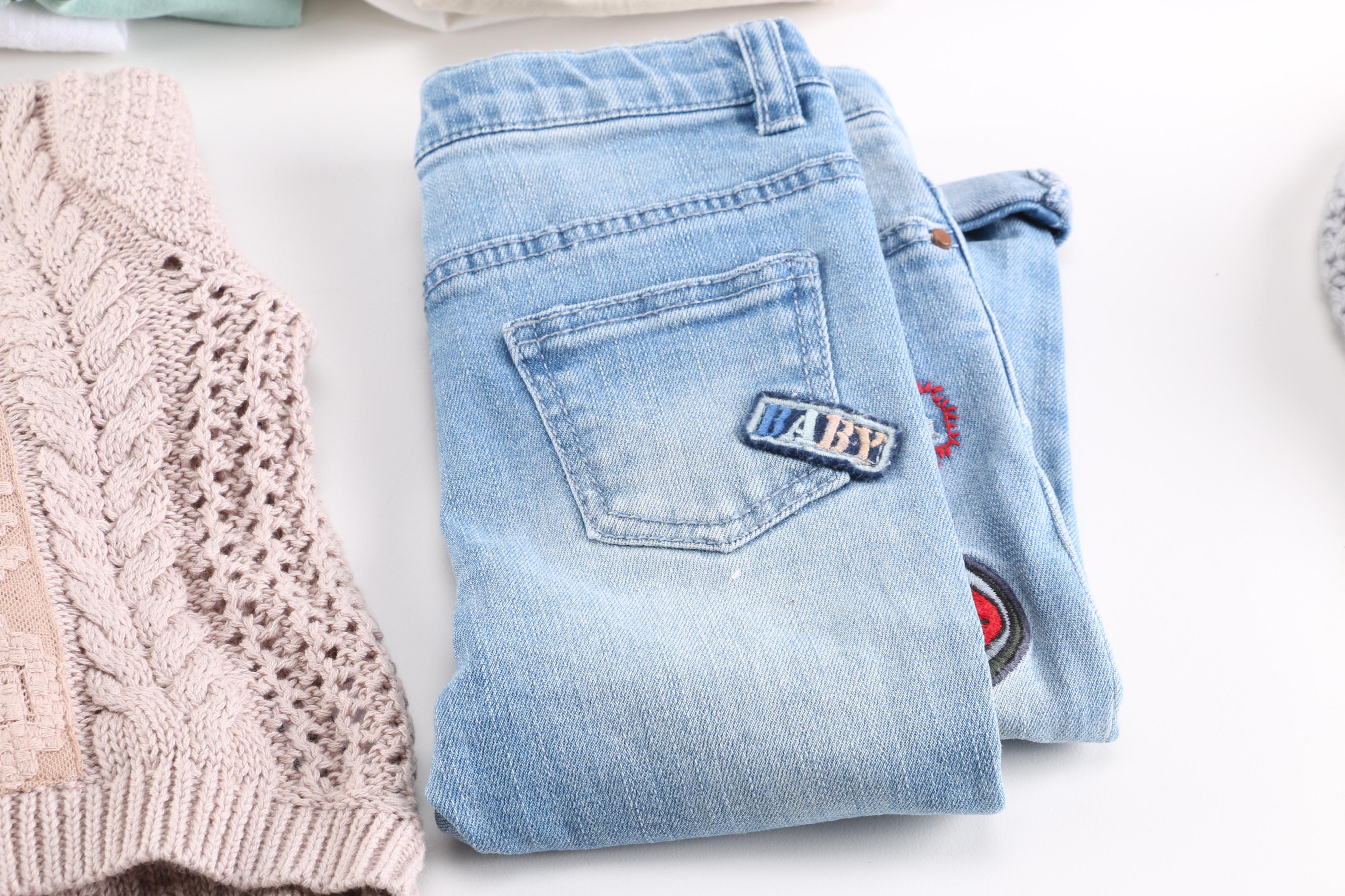 Collection of Baby Clothes and Accessories