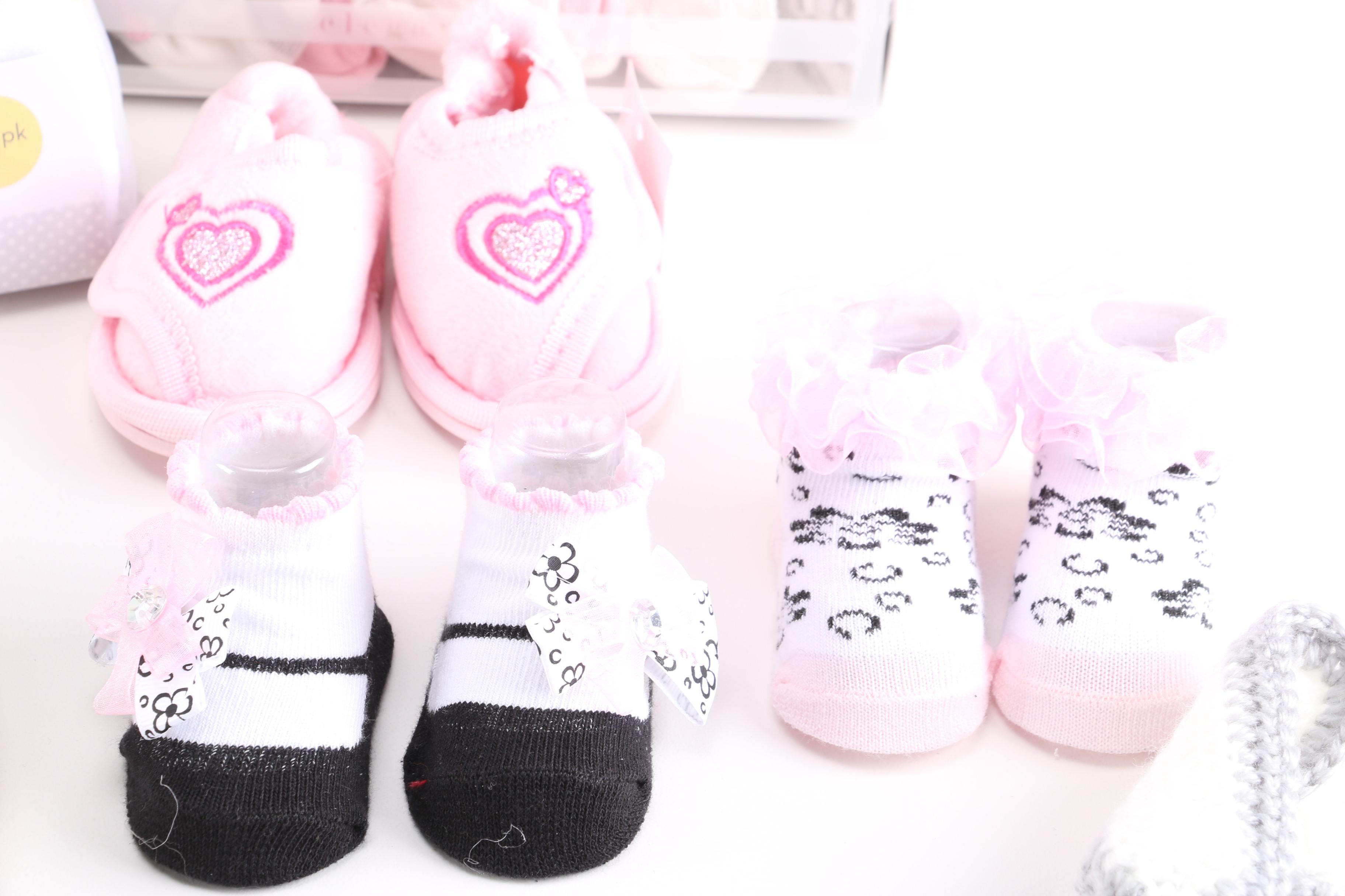 Collection of Baby Clothes and Accessories