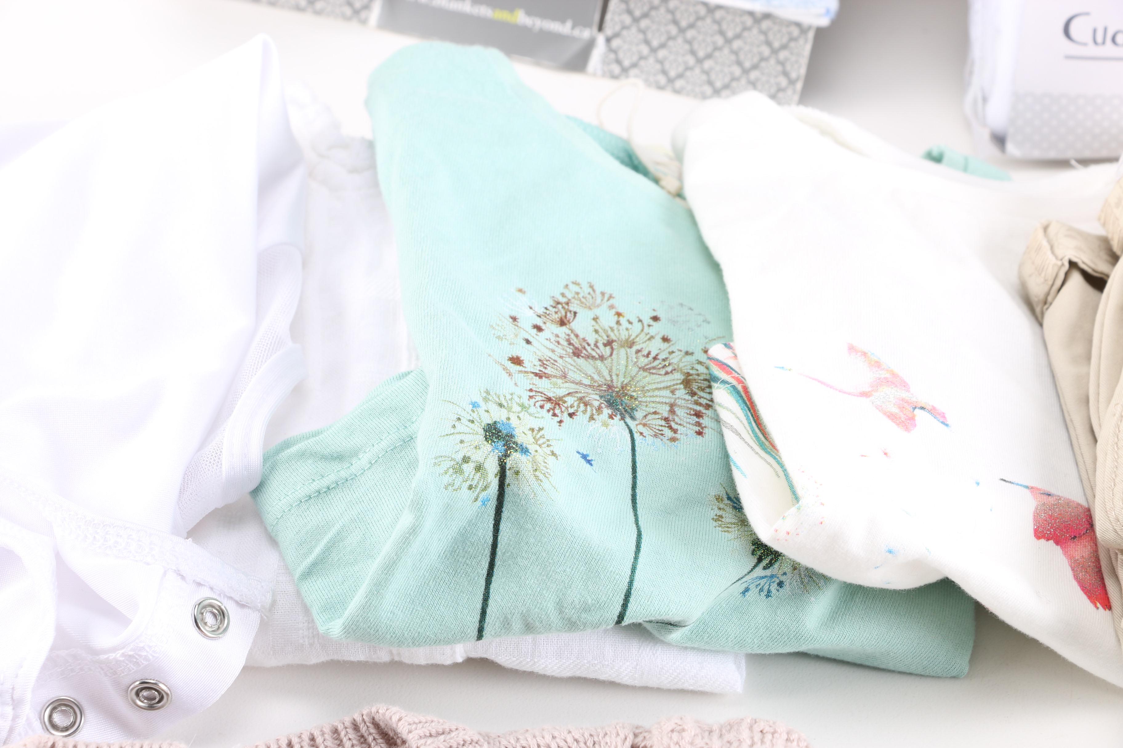 Collection of Baby Clothes and Accessories