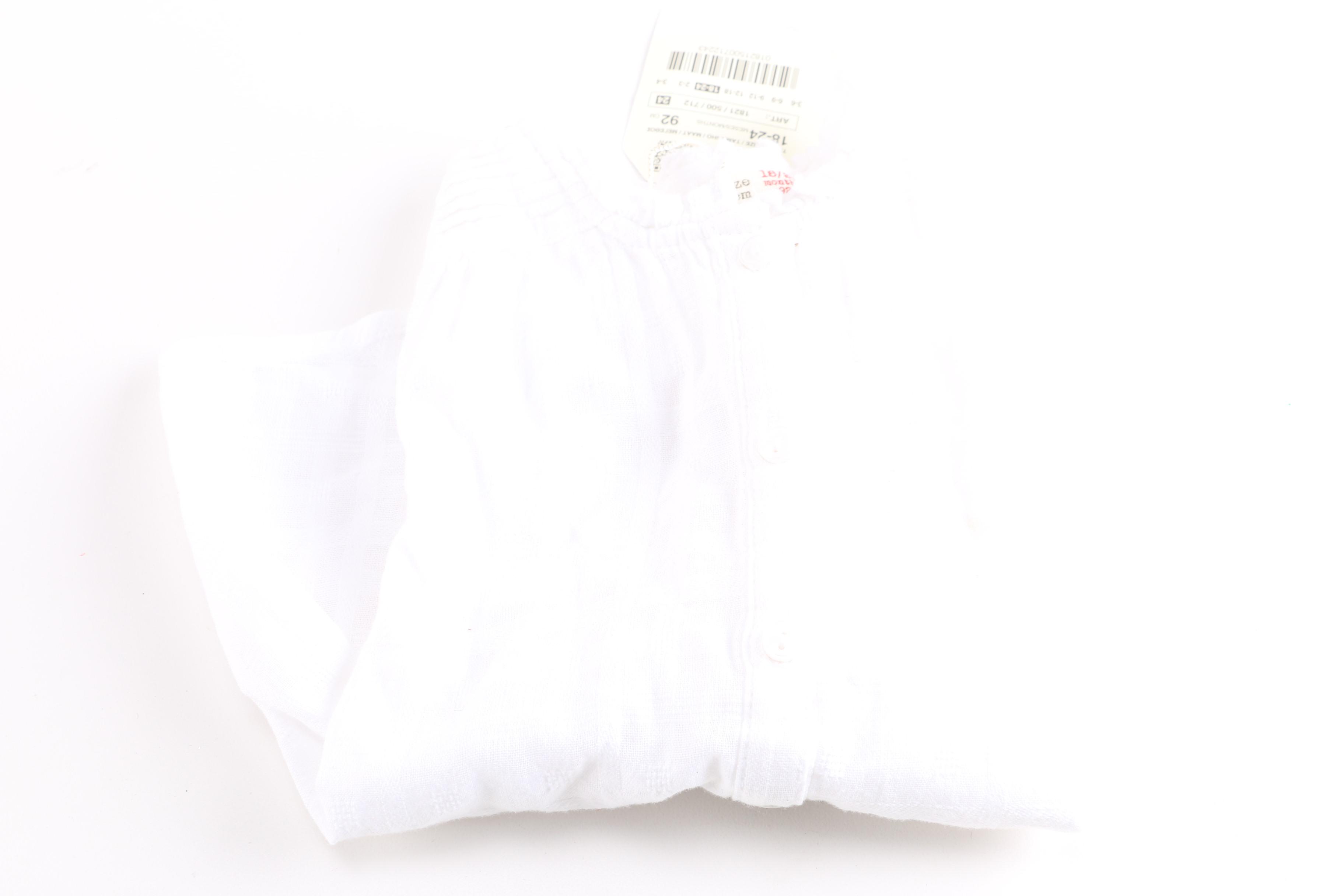 Collection of Baby Clothes and Accessories