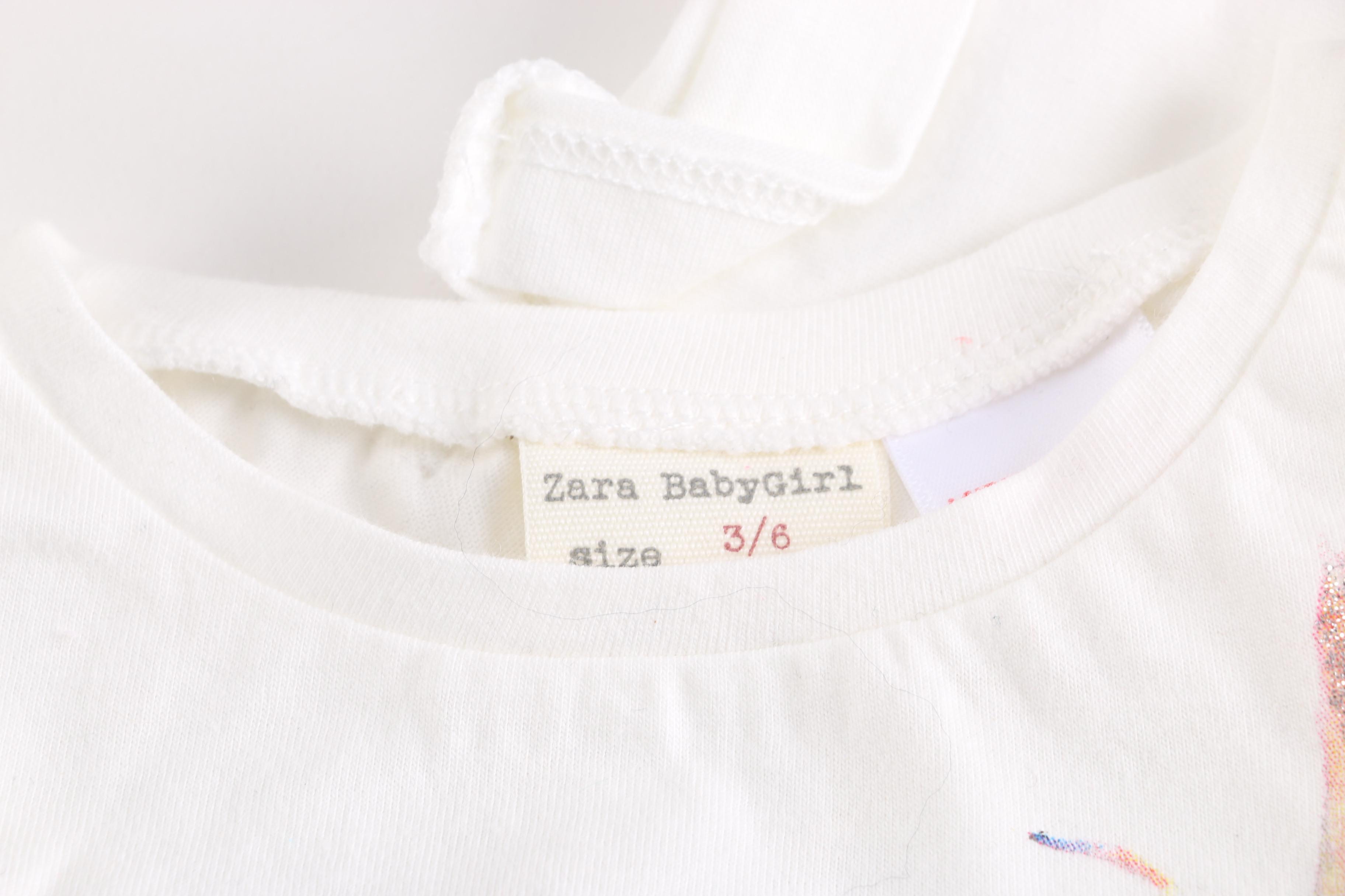 Collection of Baby Clothes and Accessories