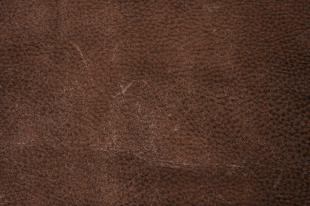 Hancock & Moore Leather Armchair and Ottoman