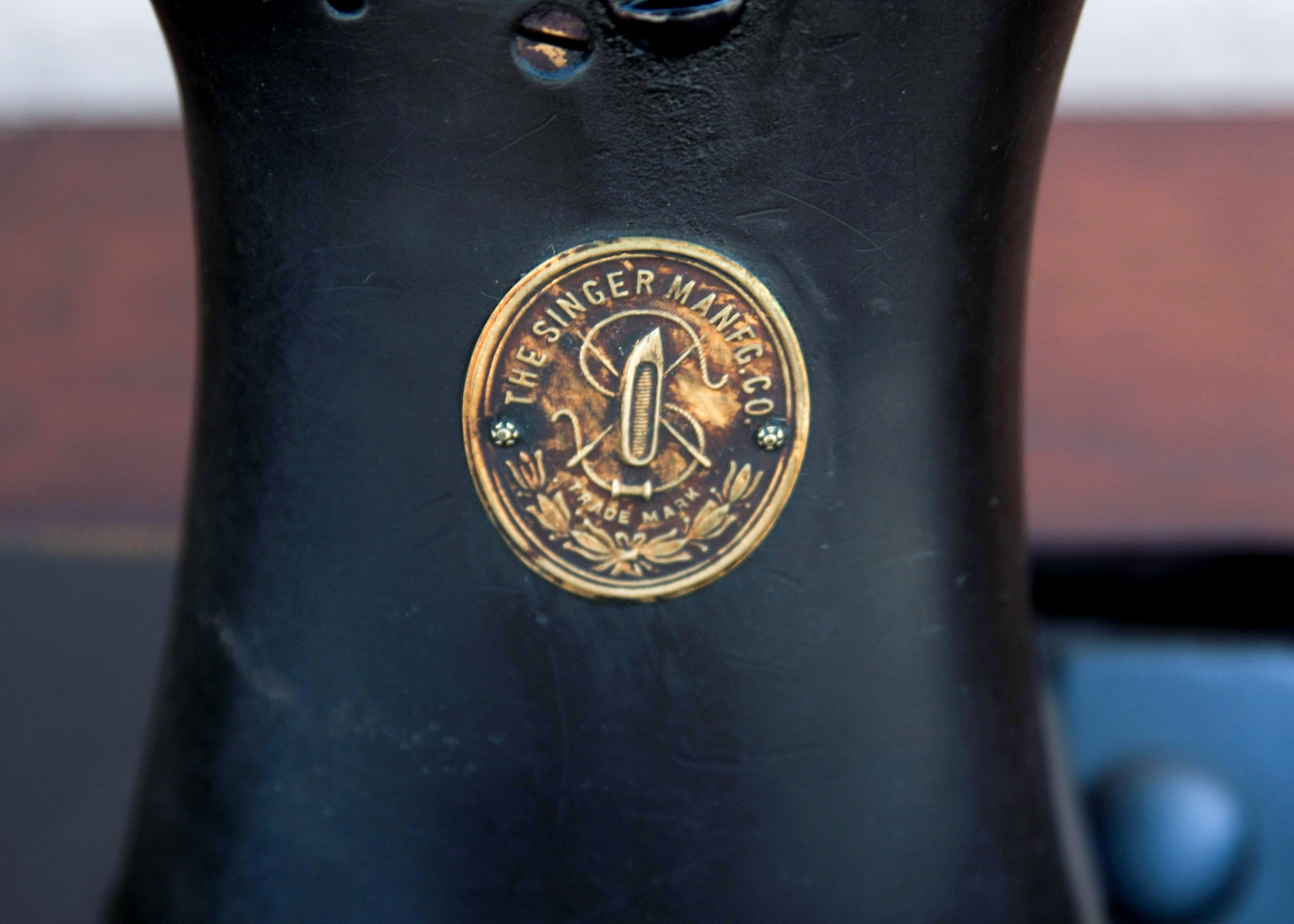 Vintage Singer Sewing Machine and Cherry Wood Sewing Table