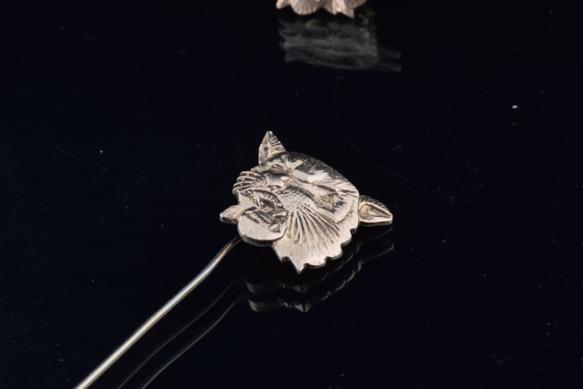 Wildcat Pins Made From Dental Gold
