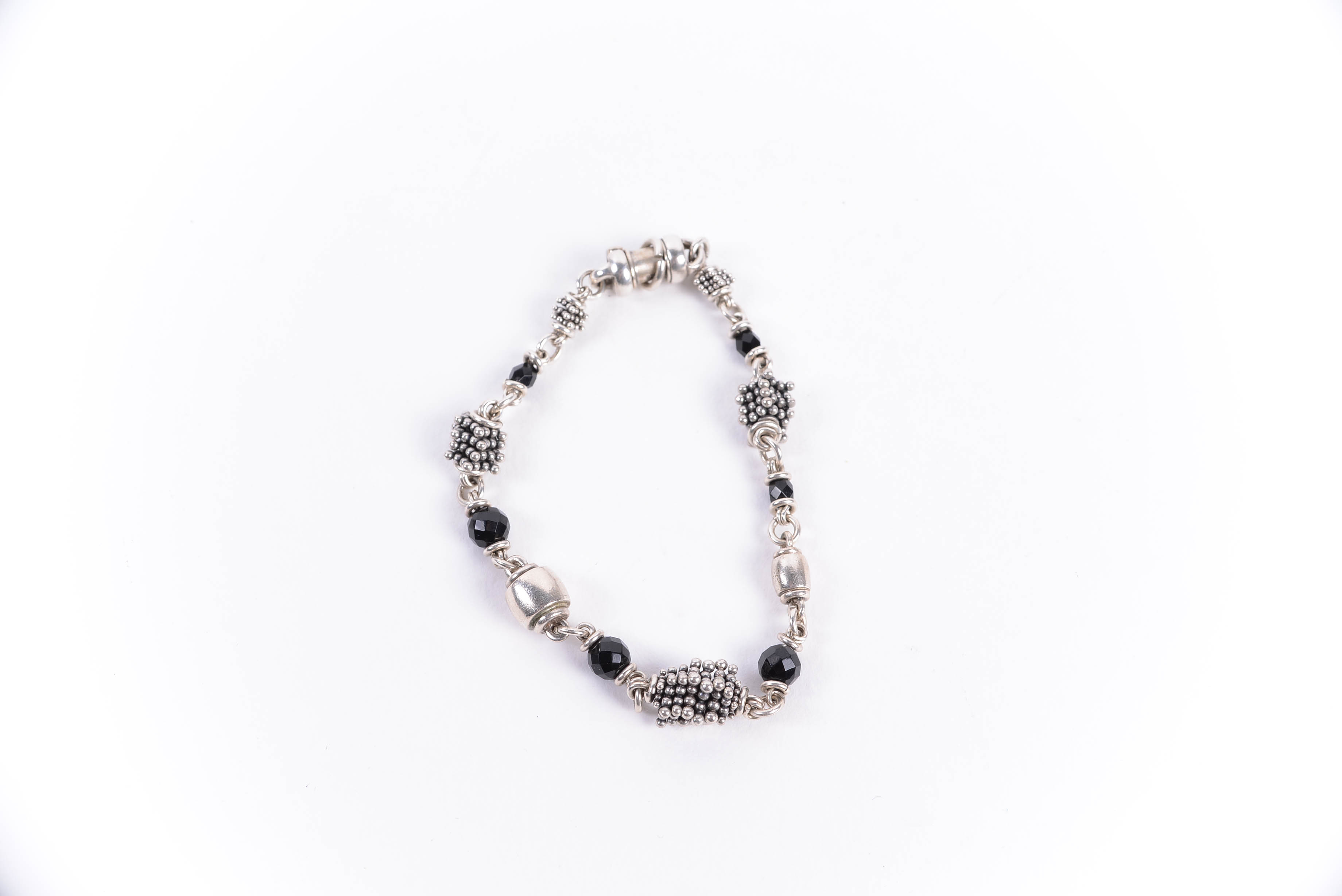 Pair of Sterling Silver Bracelets Including Michael Dawkins