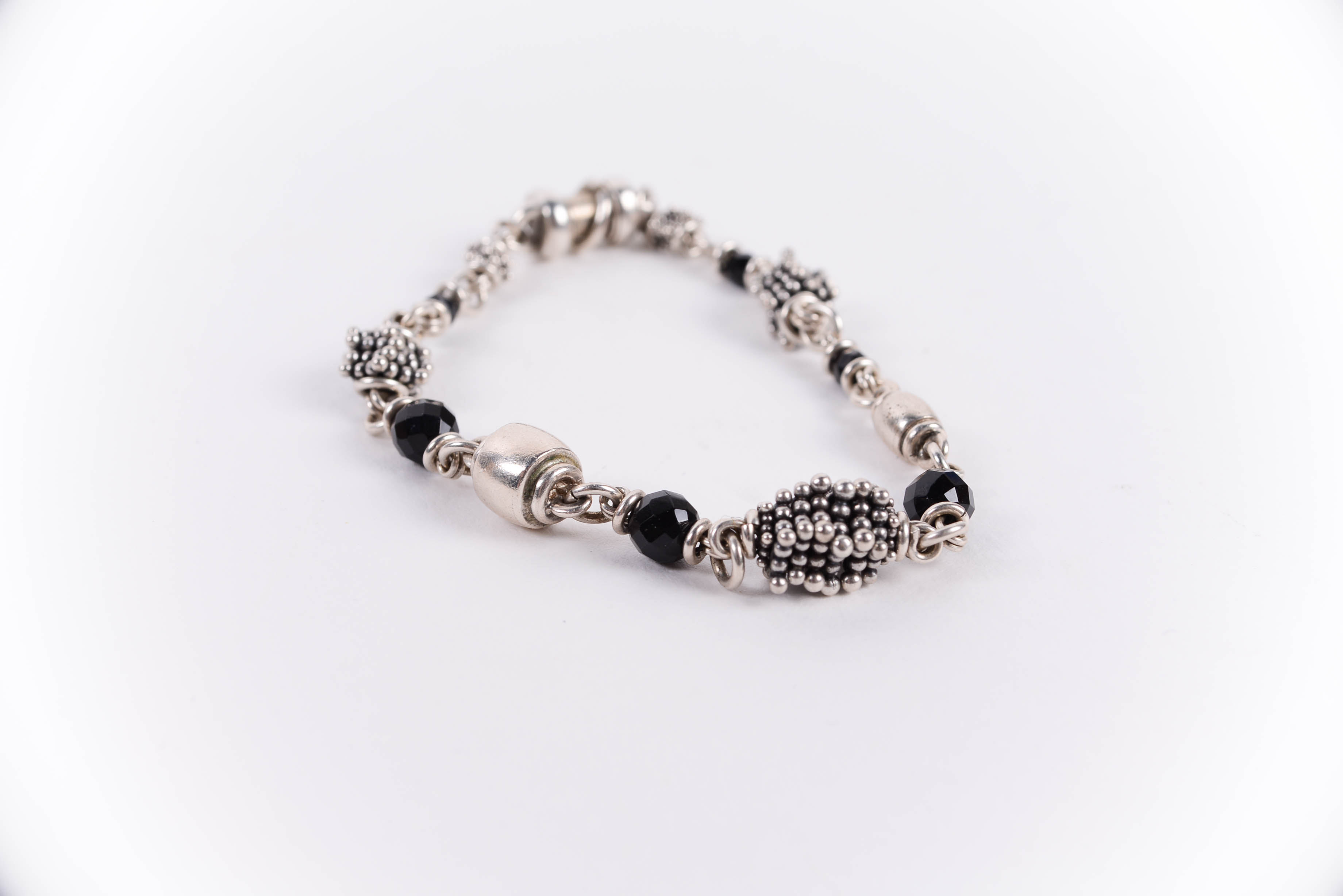 Pair of Sterling Silver Bracelets Including Michael Dawkins