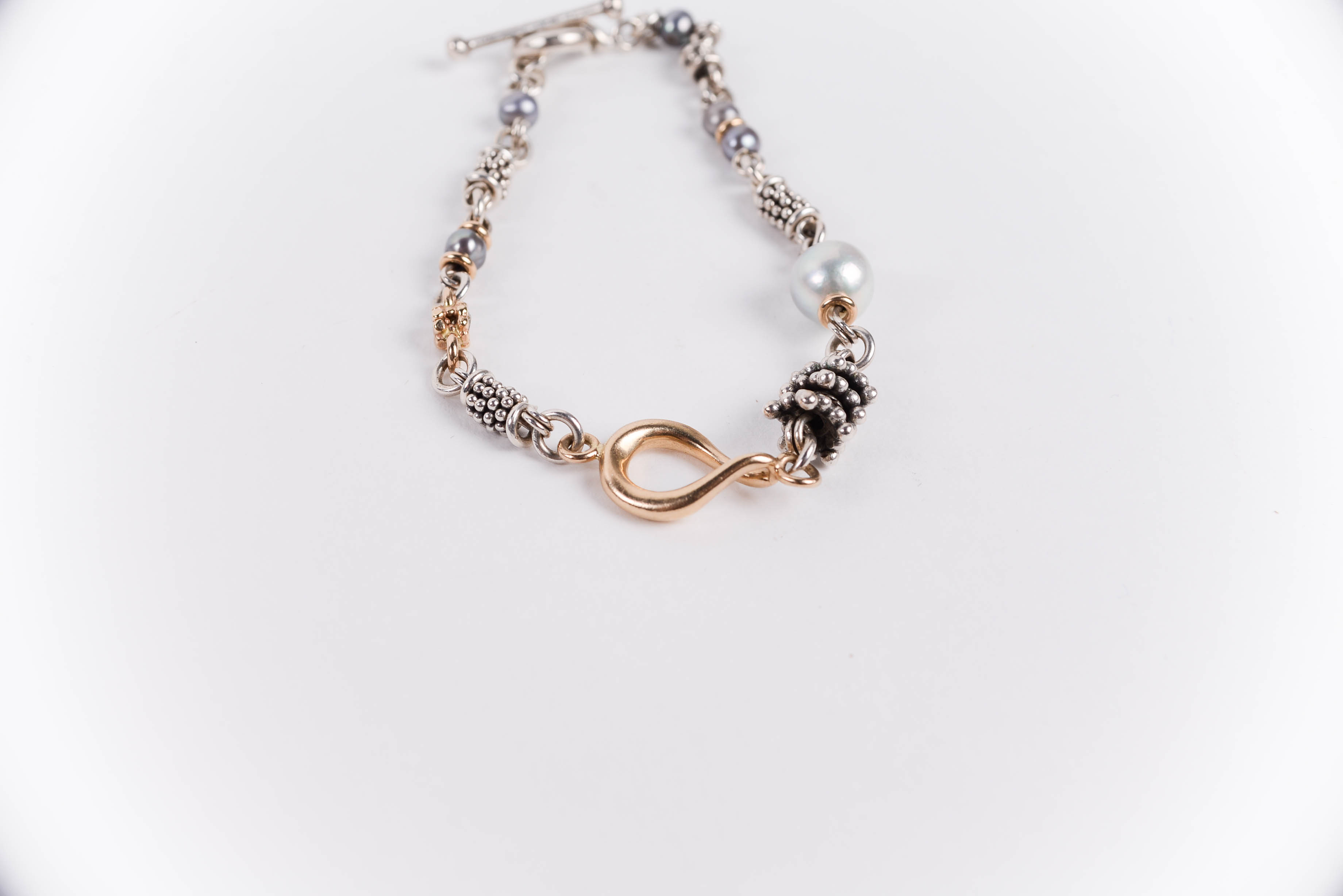 Pair of Sterling Silver Bracelets Including Michael Dawkins