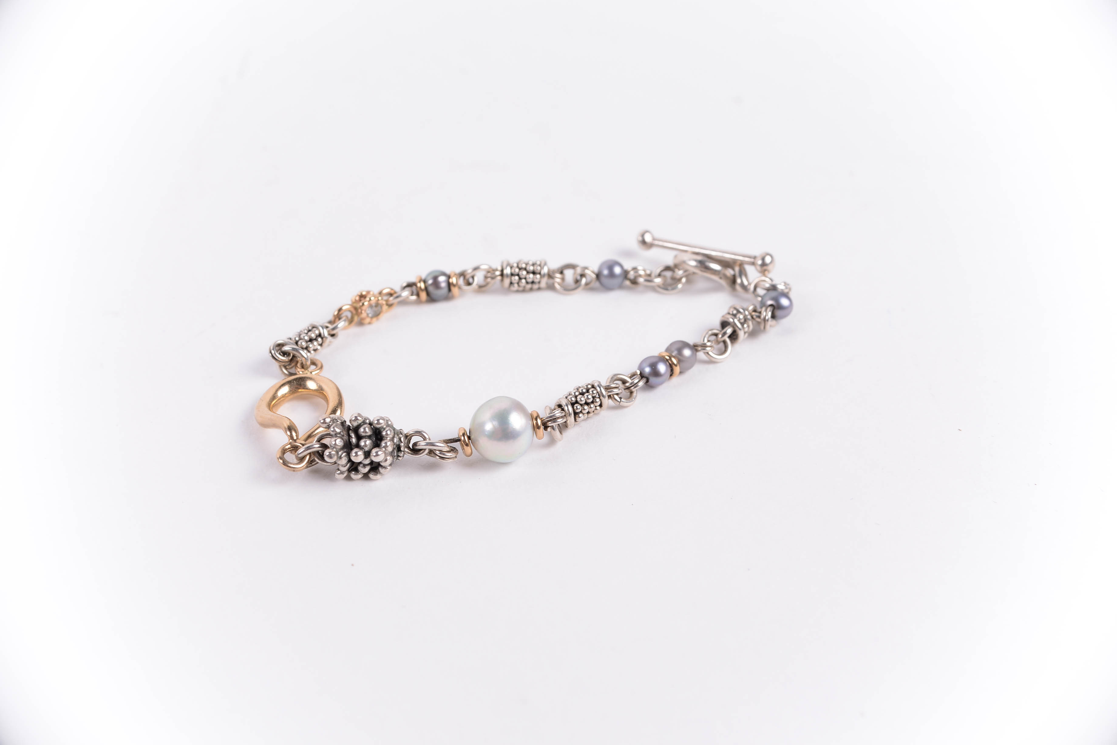 Pair of Sterling Silver Bracelets Including Michael Dawkins