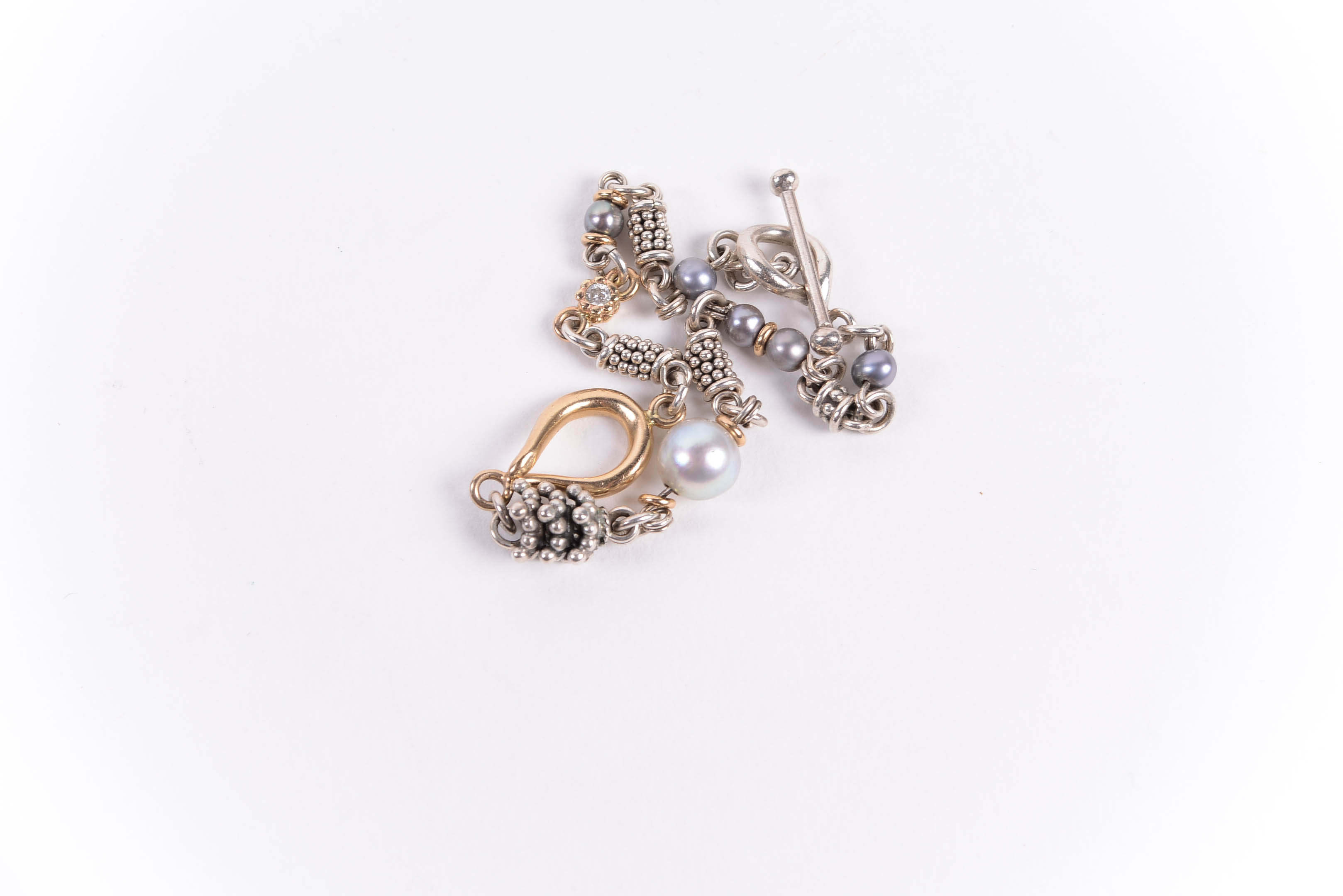 Pair of Sterling Silver Bracelets Including Michael Dawkins