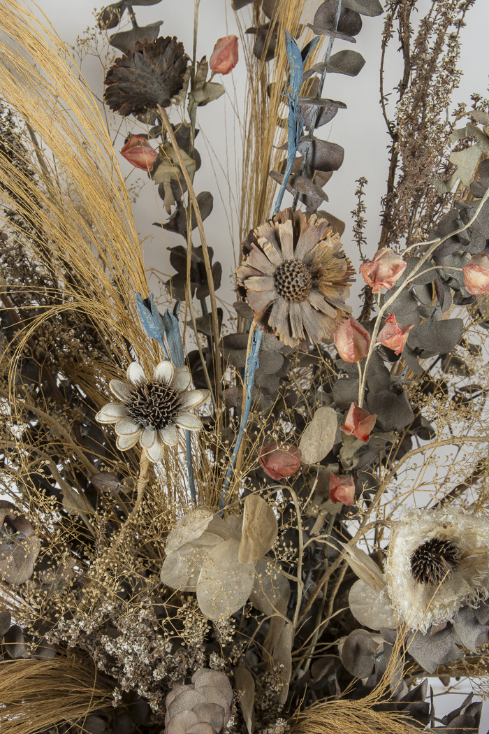 Pottery Vase and Decorative Floral Arrangement