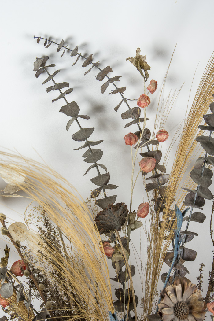 Pottery Vase and Decorative Floral Arrangement