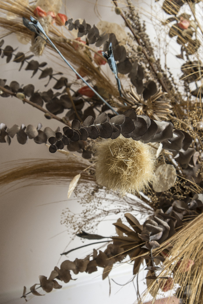 Pottery Vase and Decorative Floral Arrangement