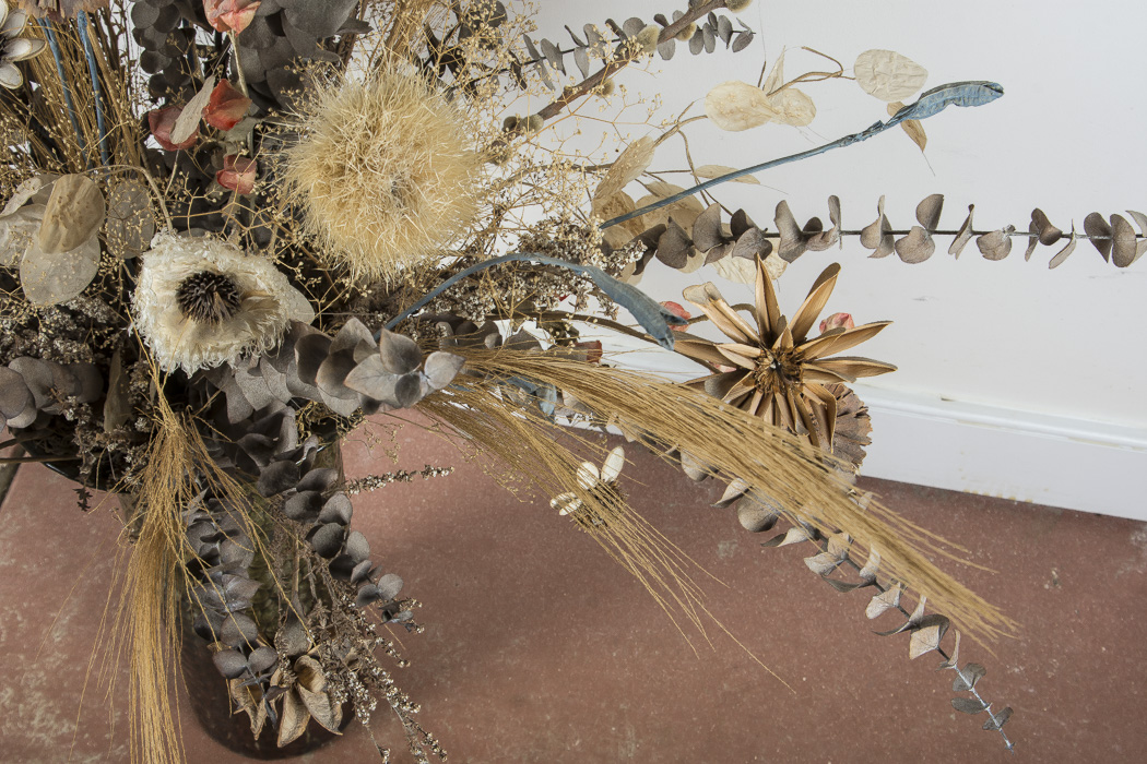 Pottery Vase and Decorative Floral Arrangement