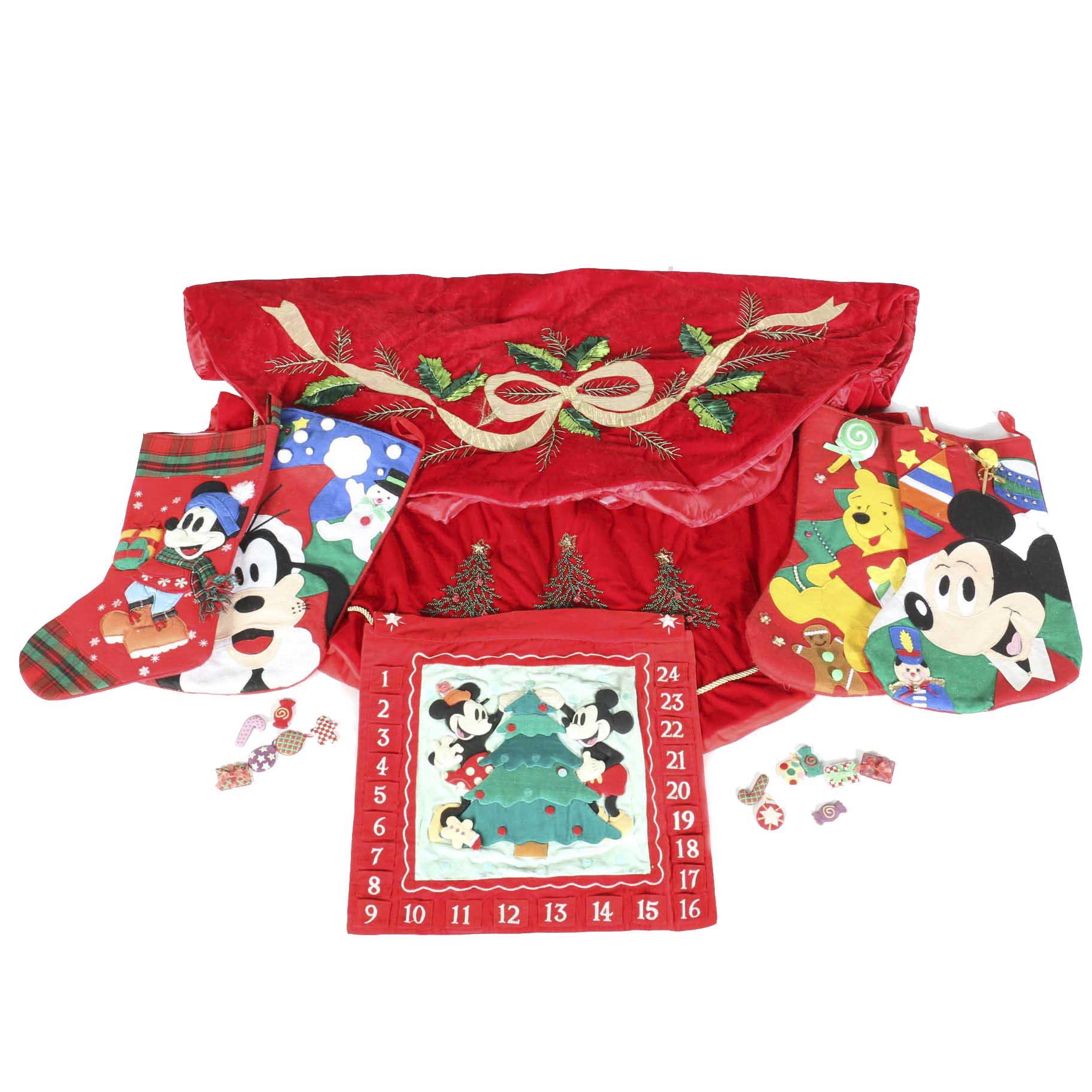 Assortment of Disney Christmas Stockings With Tree Skirts