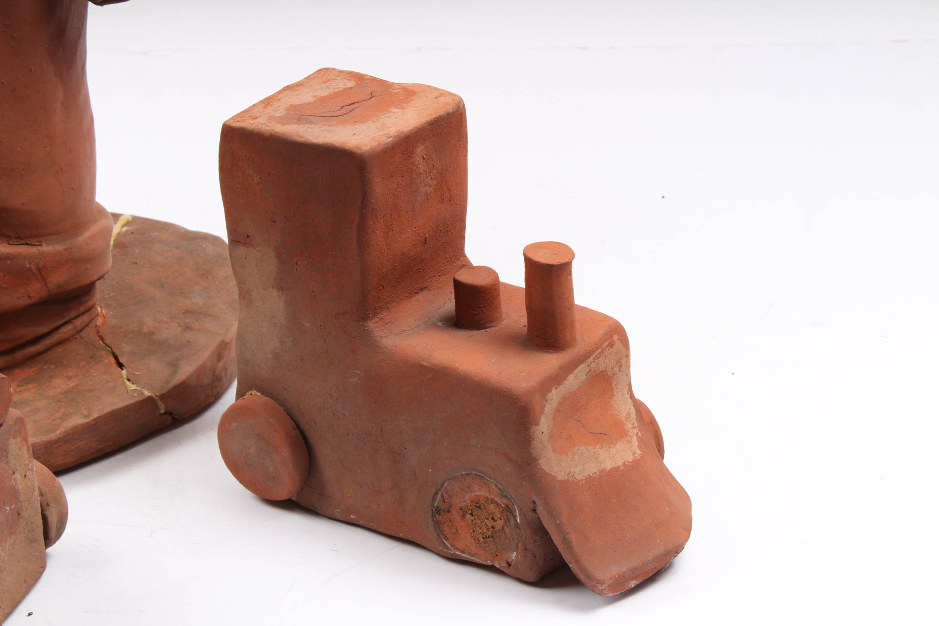 Ann Entis Boy and Train Terracotta Sculptures