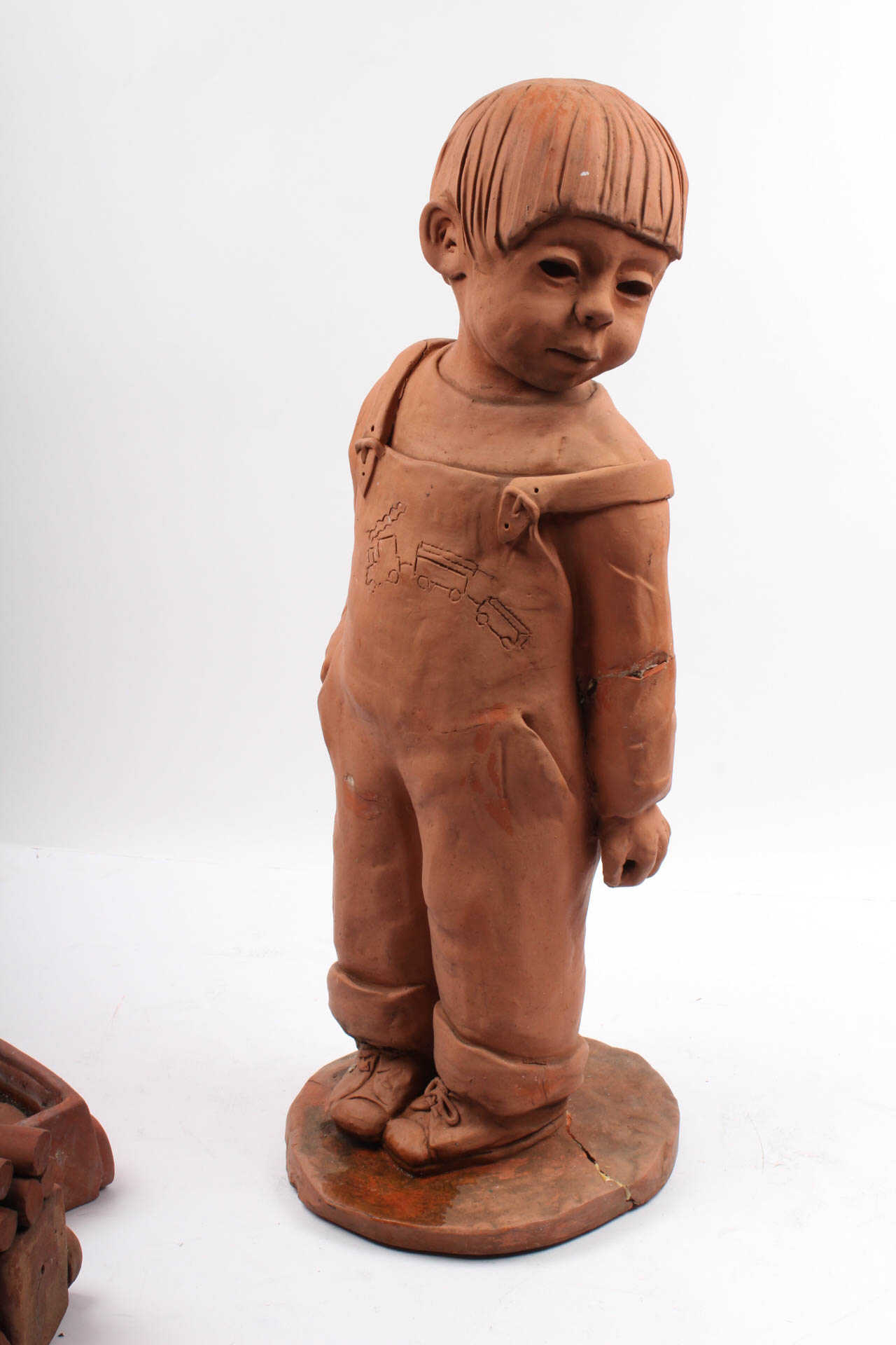 Ann Entis Boy and Train Terracotta Sculptures