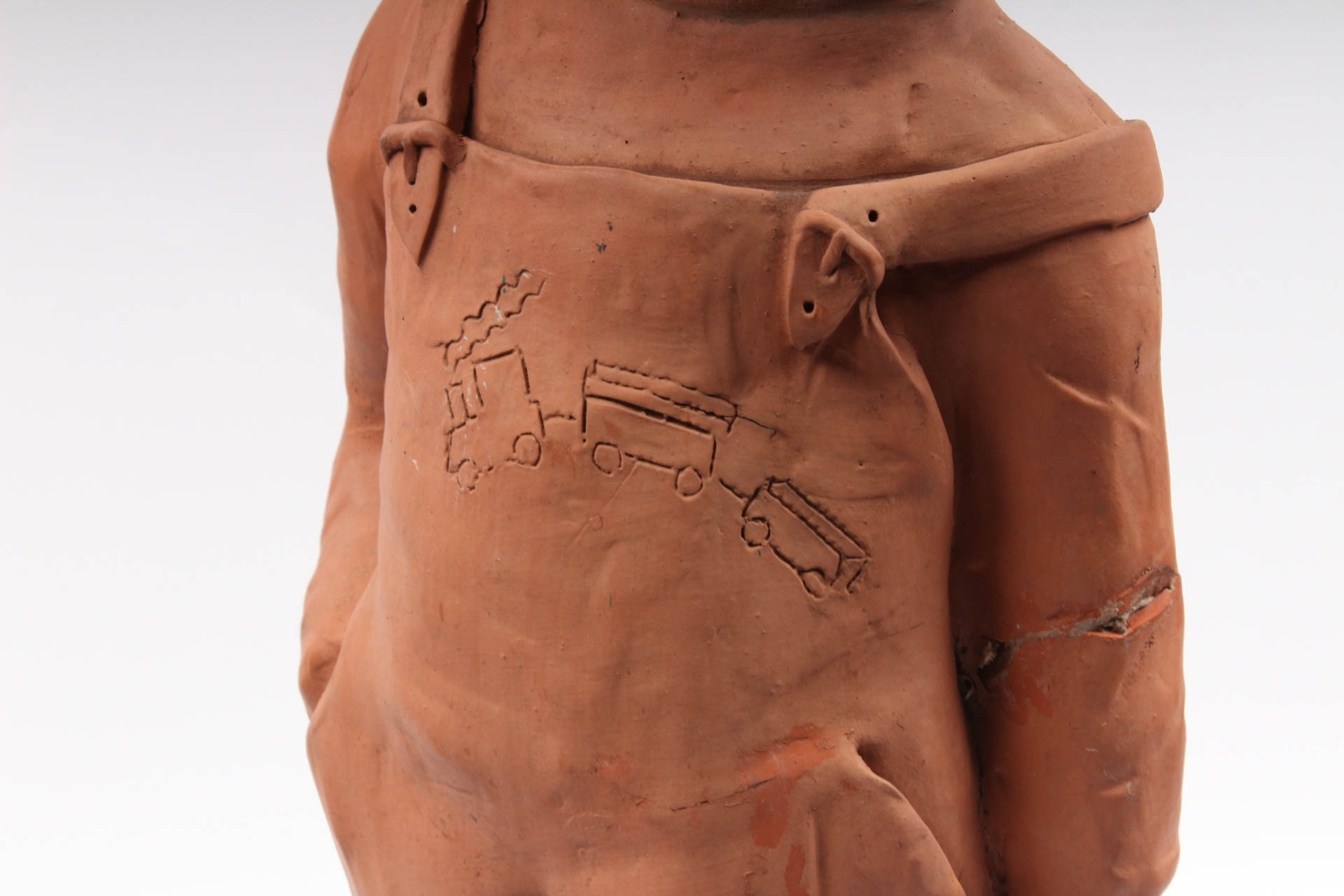 Ann Entis Boy and Train Terracotta Sculptures