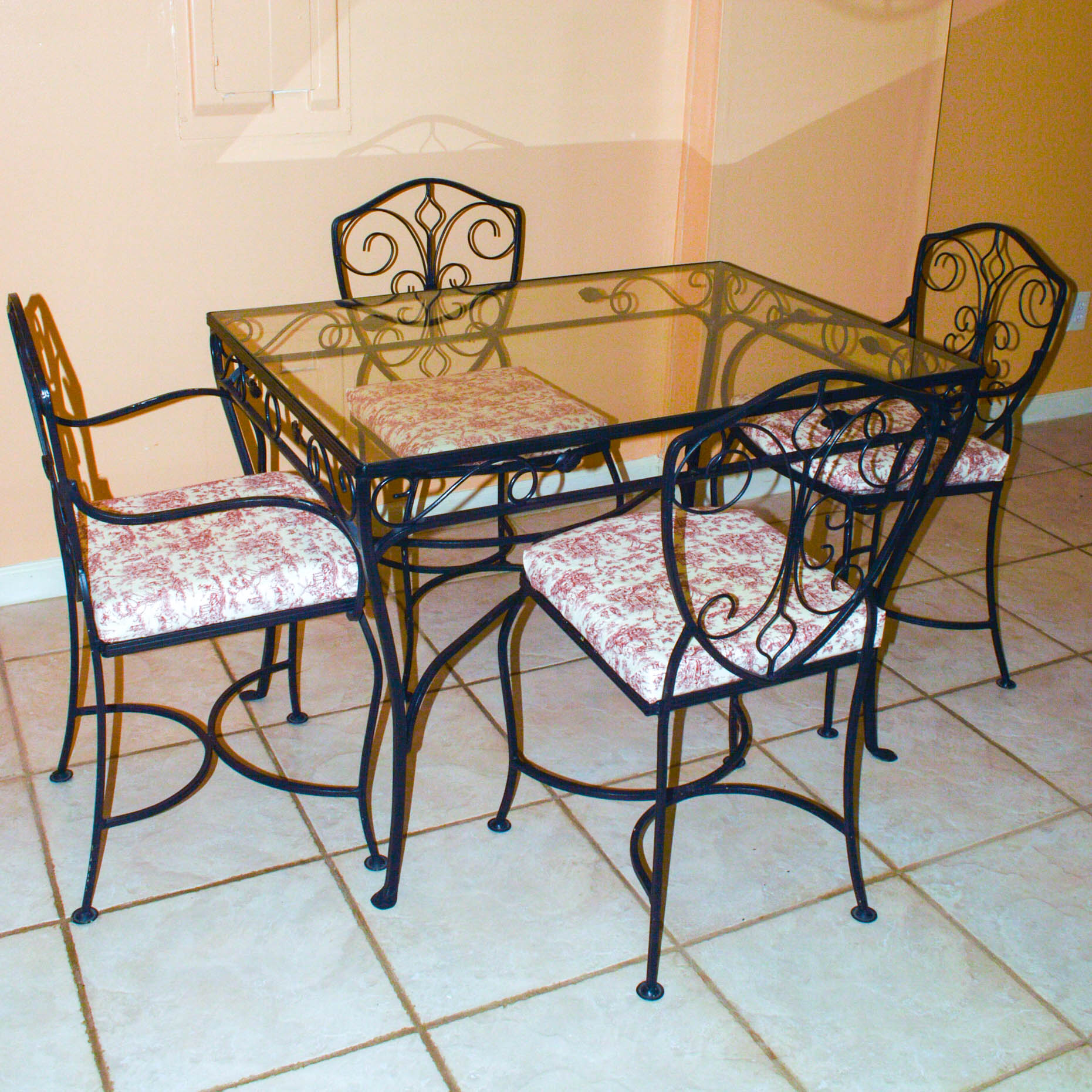 Glass-Topped Metal Dinette With Four Chairs