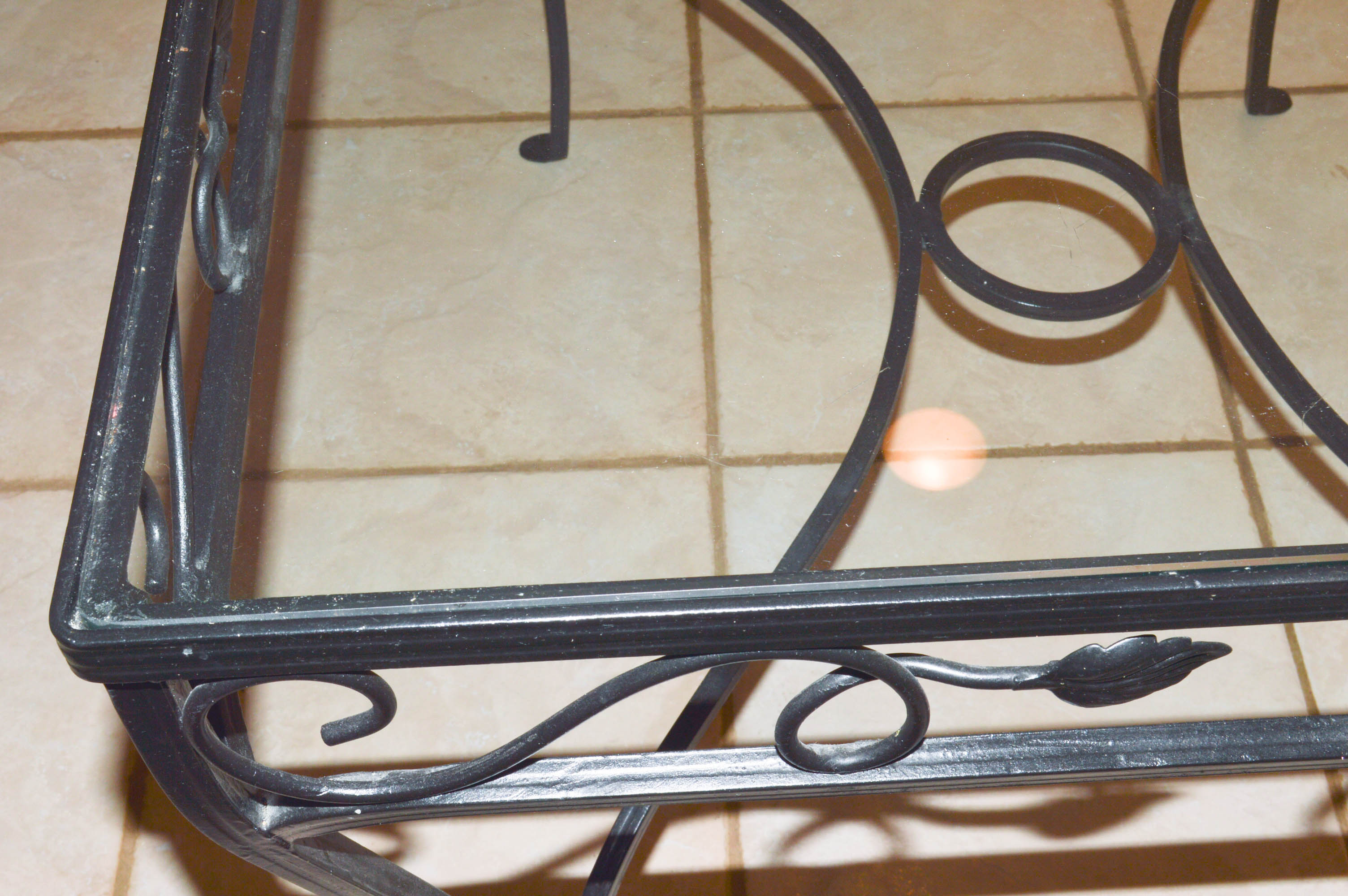 Glass-Topped Metal Dinette With Four Chairs