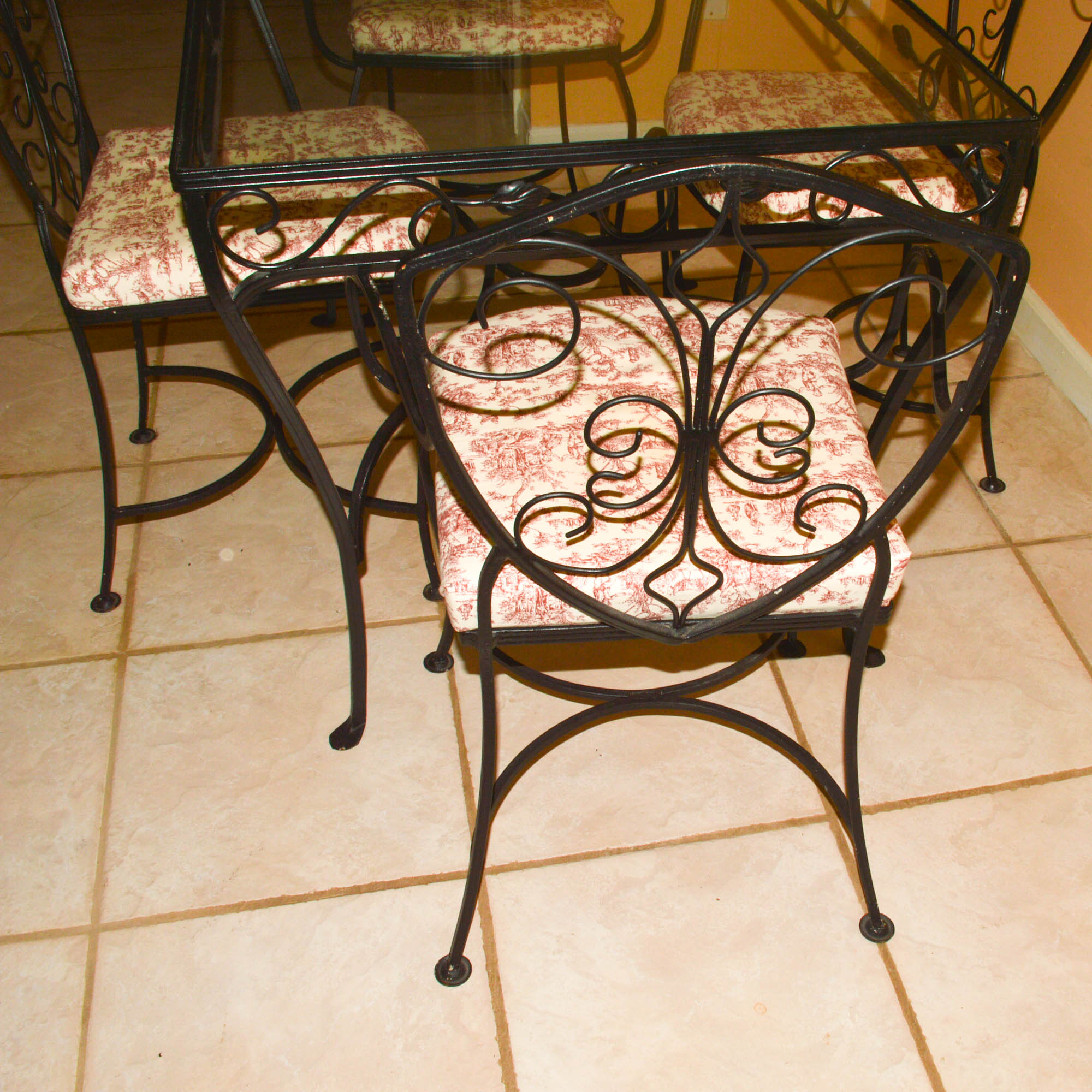 Glass-Topped Metal Dinette With Four Chairs