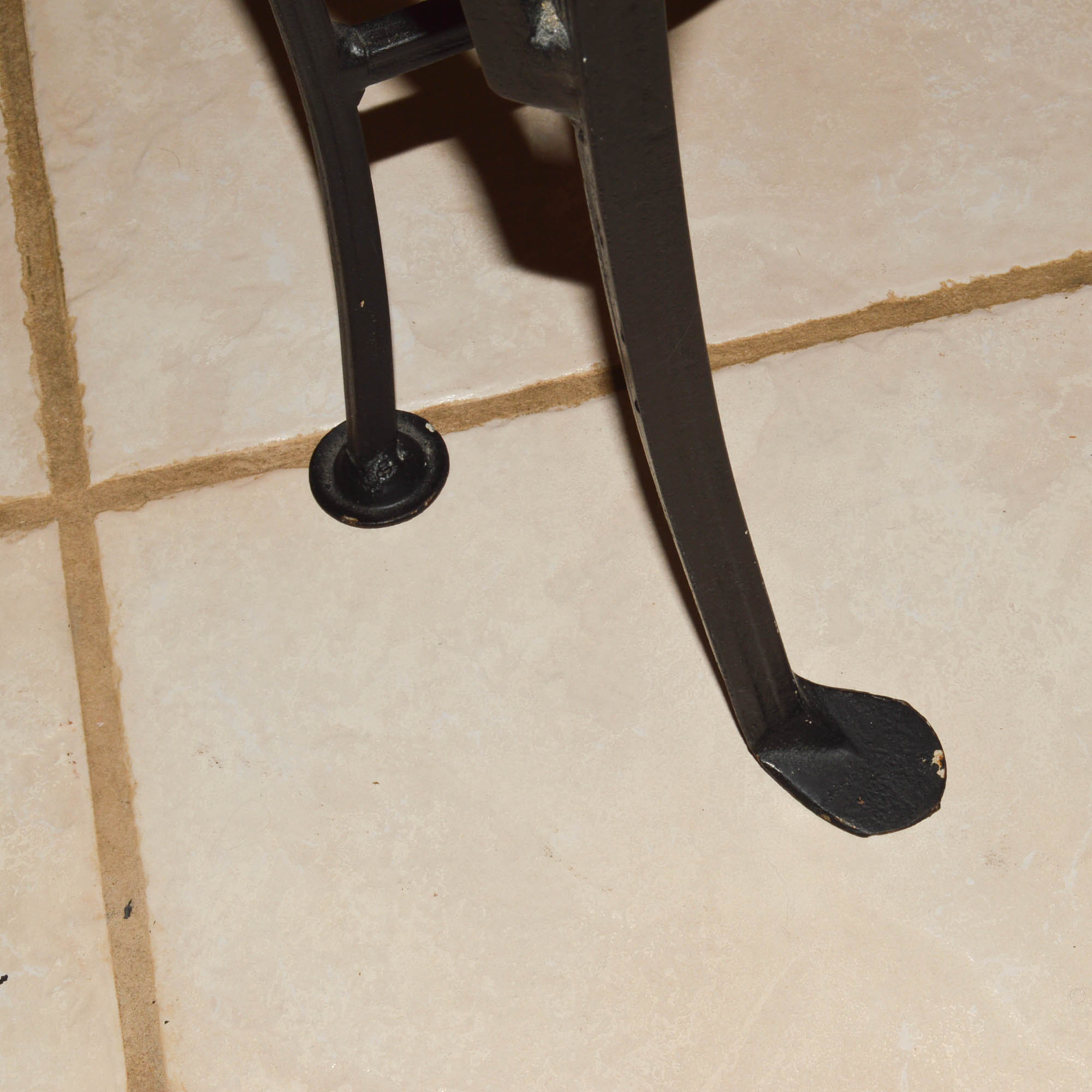 Glass-Topped Metal Dinette With Four Chairs