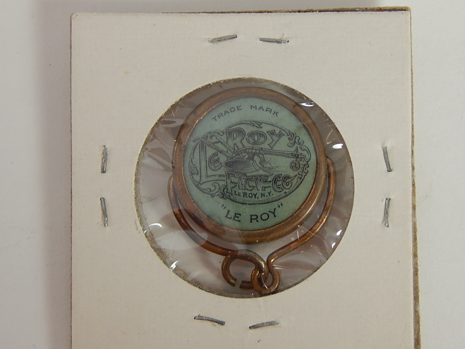 Antique Leroy Plow Co. Agricultural Celluloid Watch Fob