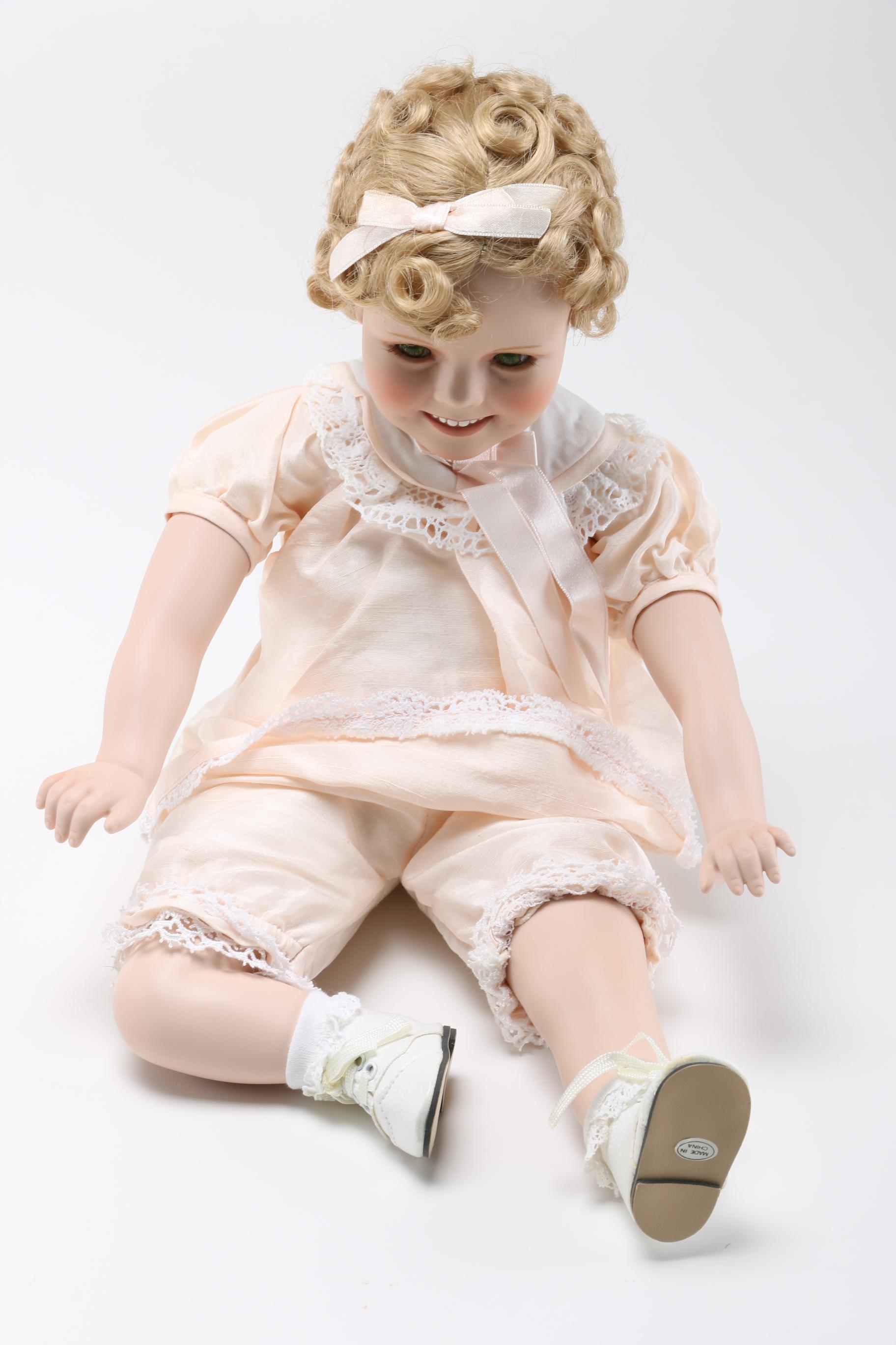 Four Danbury Mint Shirley Temple Dolls