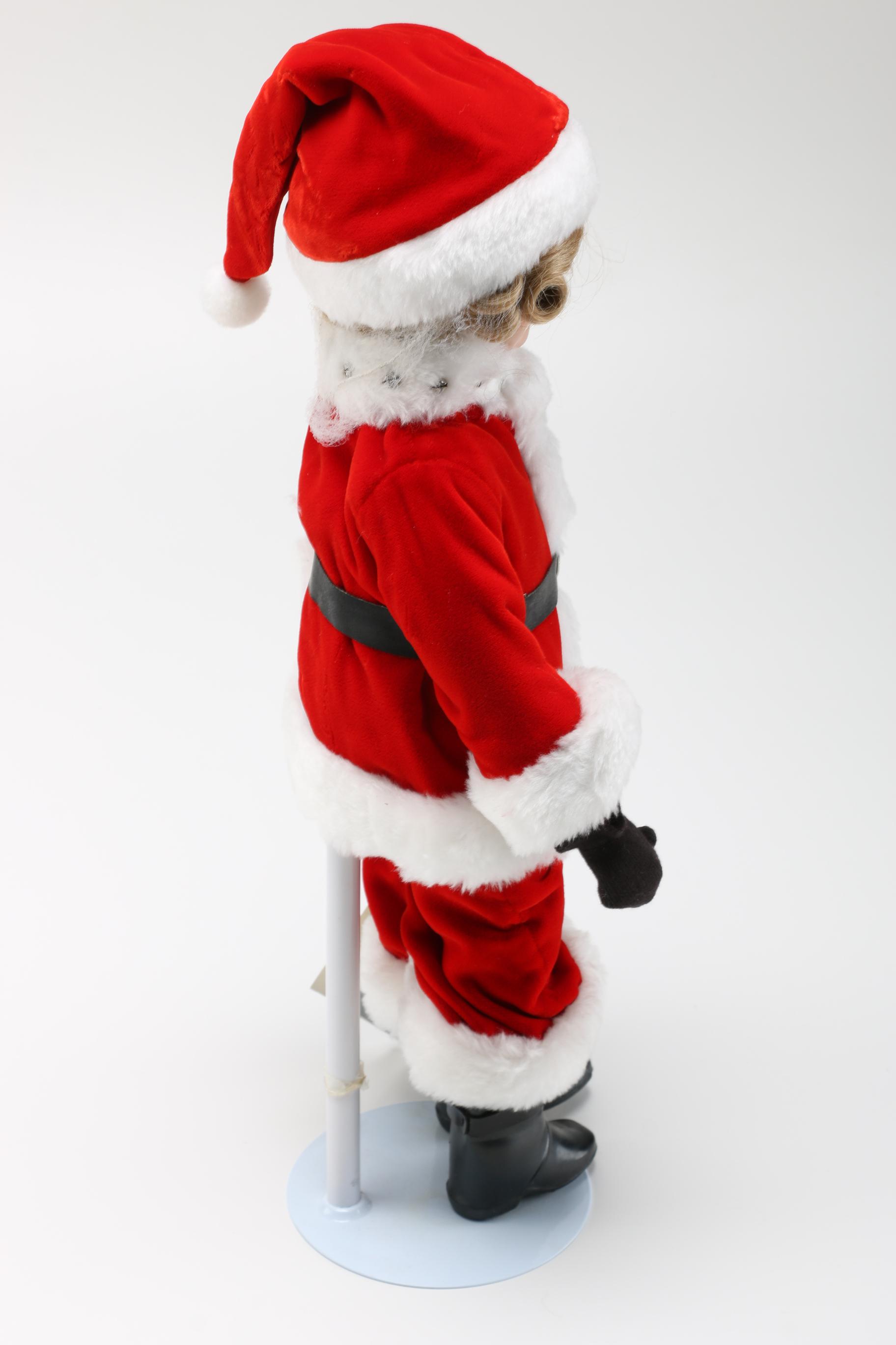 Four Danbury Mint Shirley Temple Dolls