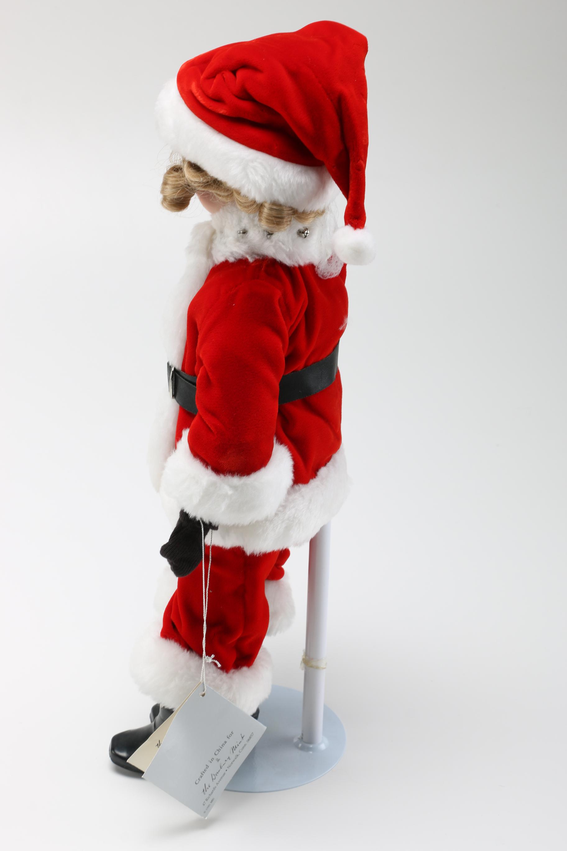 Four Danbury Mint Shirley Temple Dolls