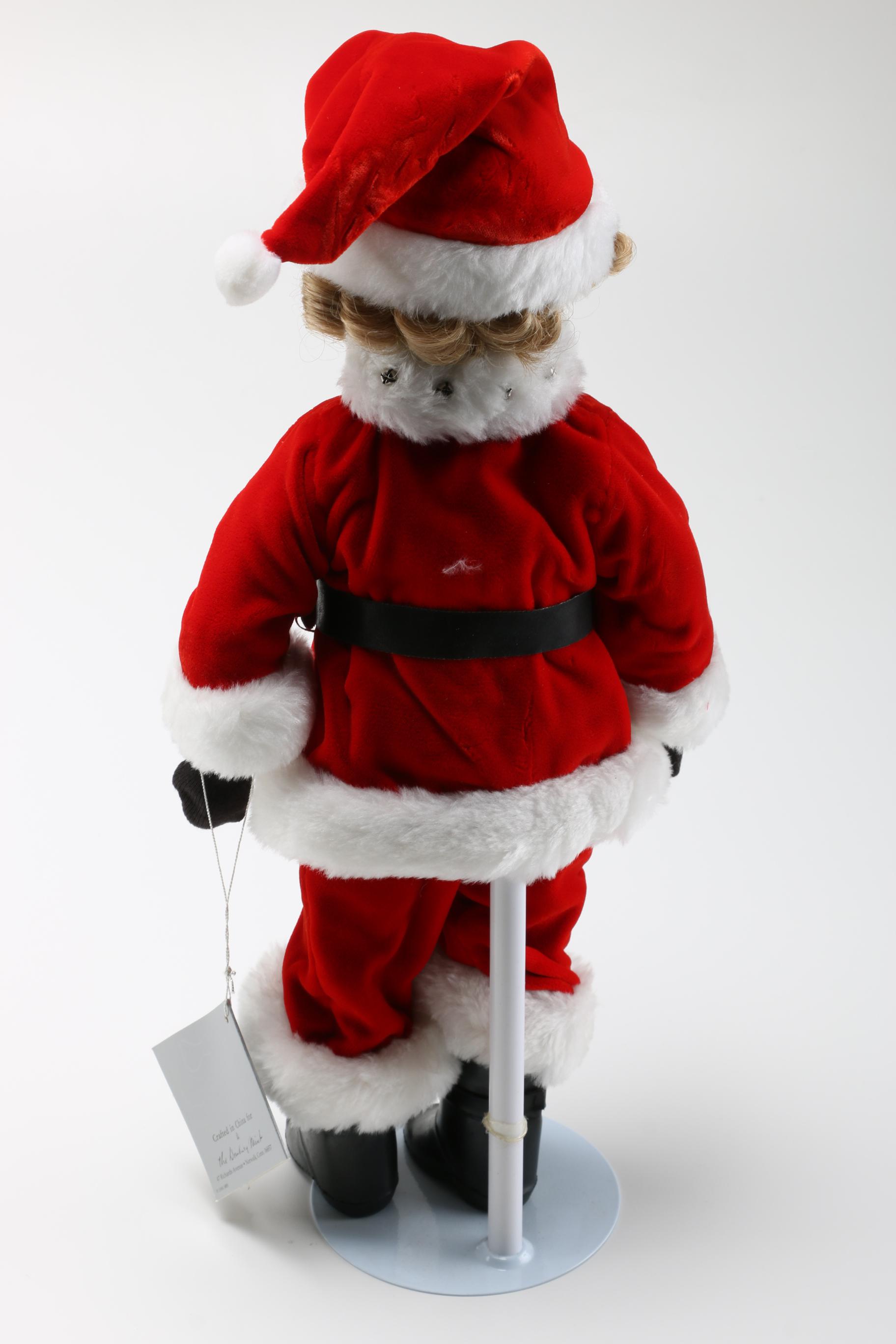 Four Danbury Mint Shirley Temple Dolls