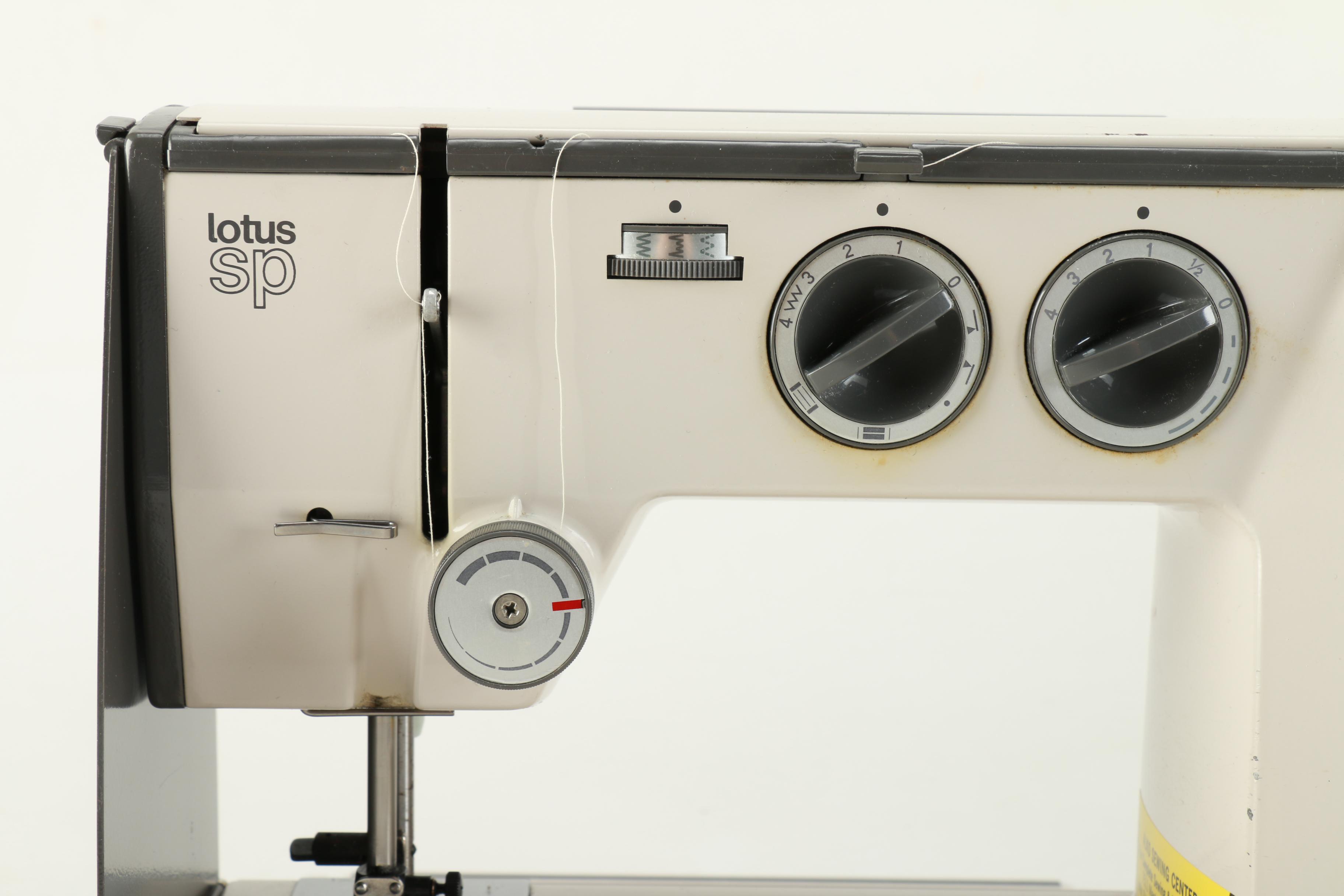 Elna "Lotus SP' Sewing Machine and Accordion Case Filled with Sewing Supplies