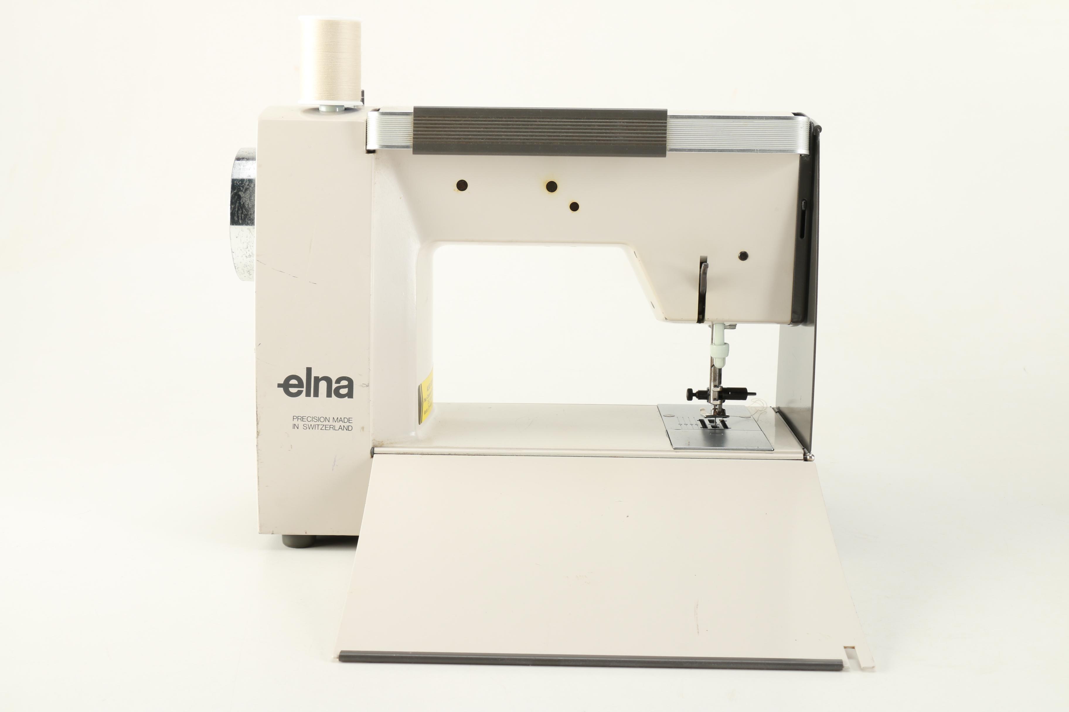 Elna "Lotus SP' Sewing Machine and Accordion Case Filled with Sewing Supplies