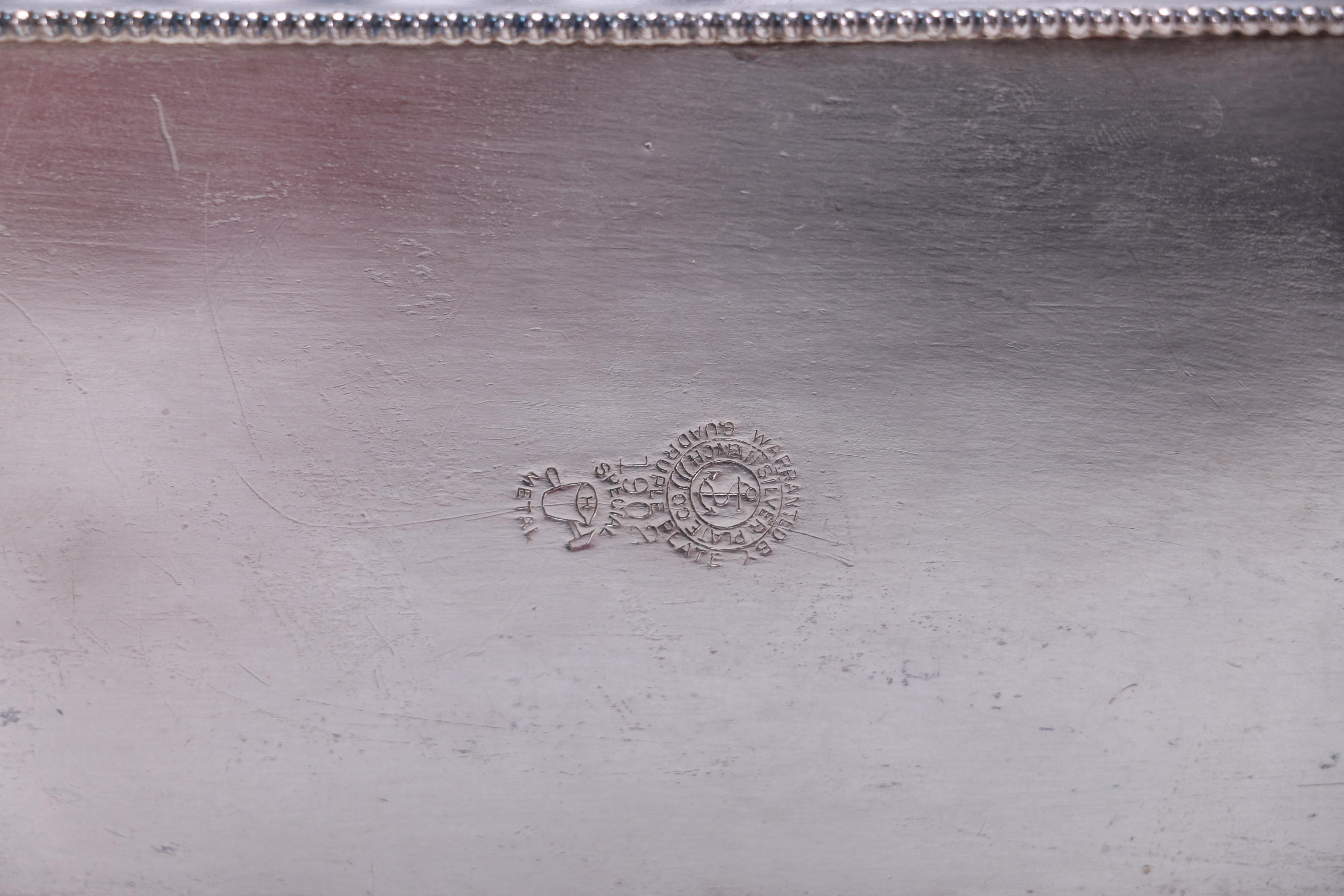 Silver Plate and Aluminum Serving and Décor Pieces Featuring Corbell & Co.