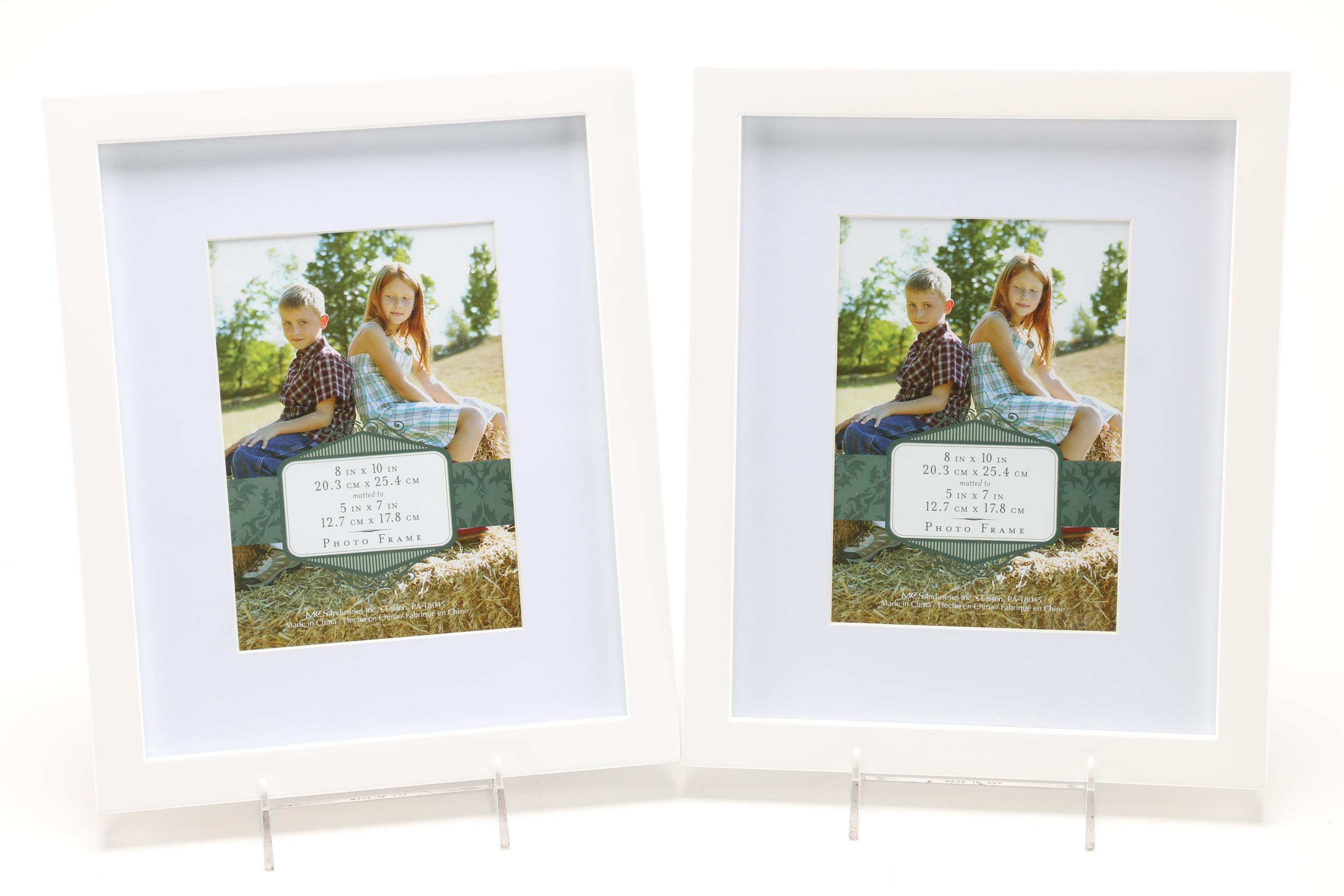Assorted Wall Picture Frames Featuring Home Images