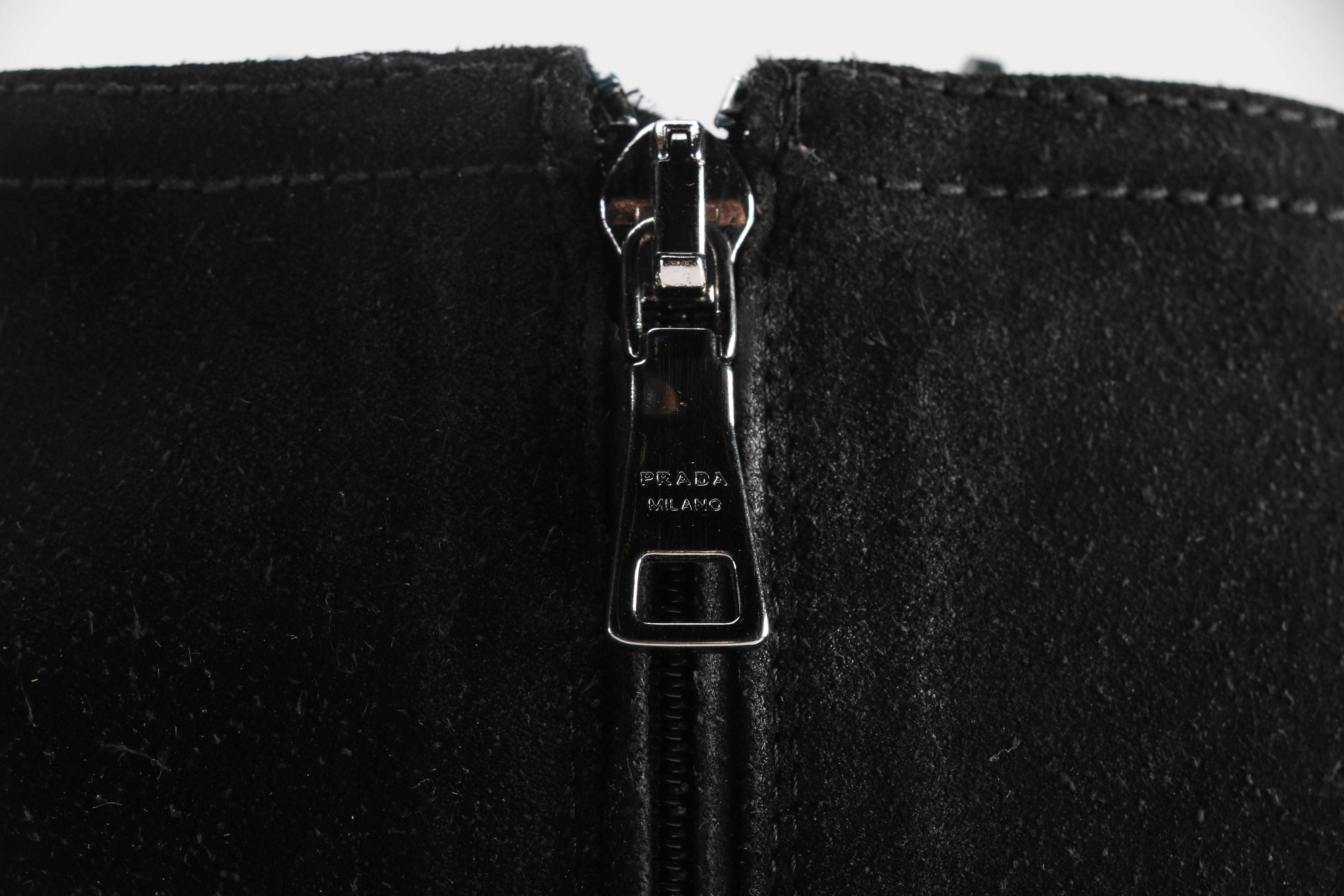 Two Pairs of Prada Boots