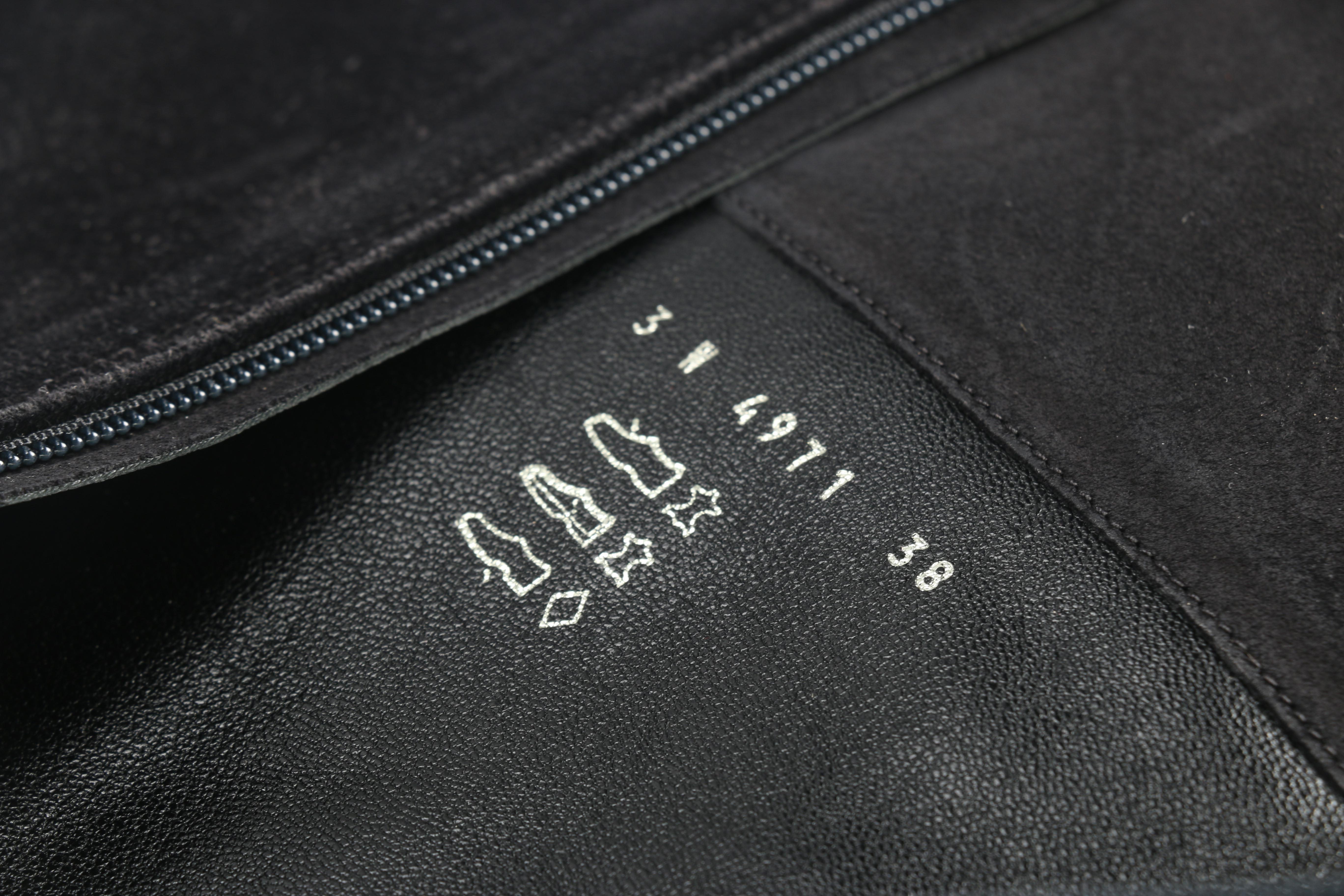 Two Pairs of Prada Boots