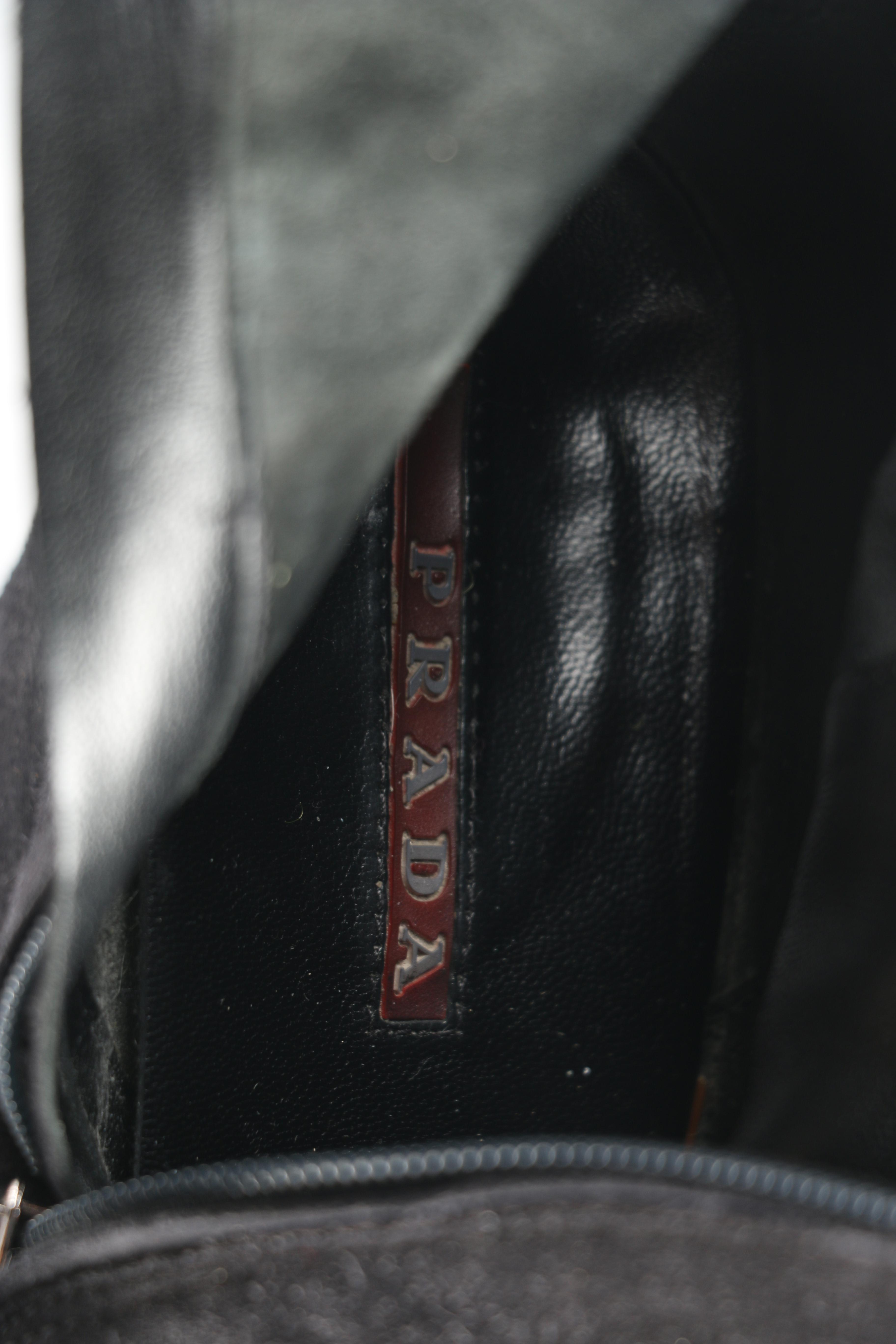 Two Pairs of Prada Boots