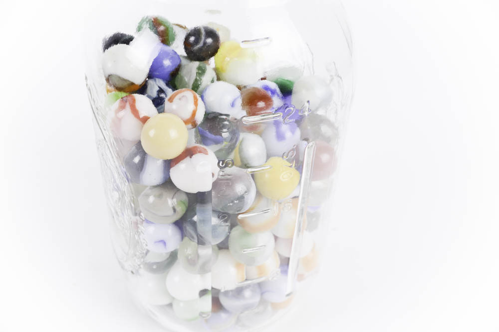 Vintage Glass Marbles and Mechanical Tin Toy Tractor