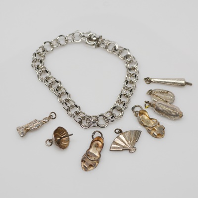 Eight Sterling Silver Summer Themed Charms and Bracelet
