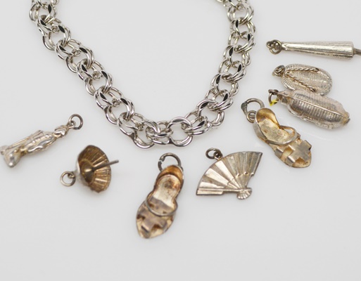 Eight Sterling Silver Summer Themed Charms and Bracelet