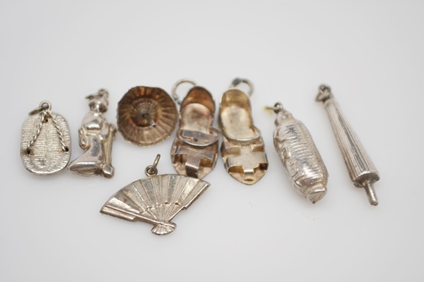 Eight Sterling Silver Summer Themed Charms and Bracelet