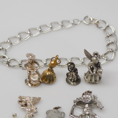 Sterling Silver Bracelet and Eleven Sterling Silver Charms
