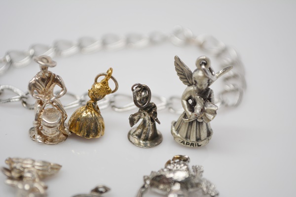 Sterling Silver Bracelet and Eleven Sterling Silver Charms