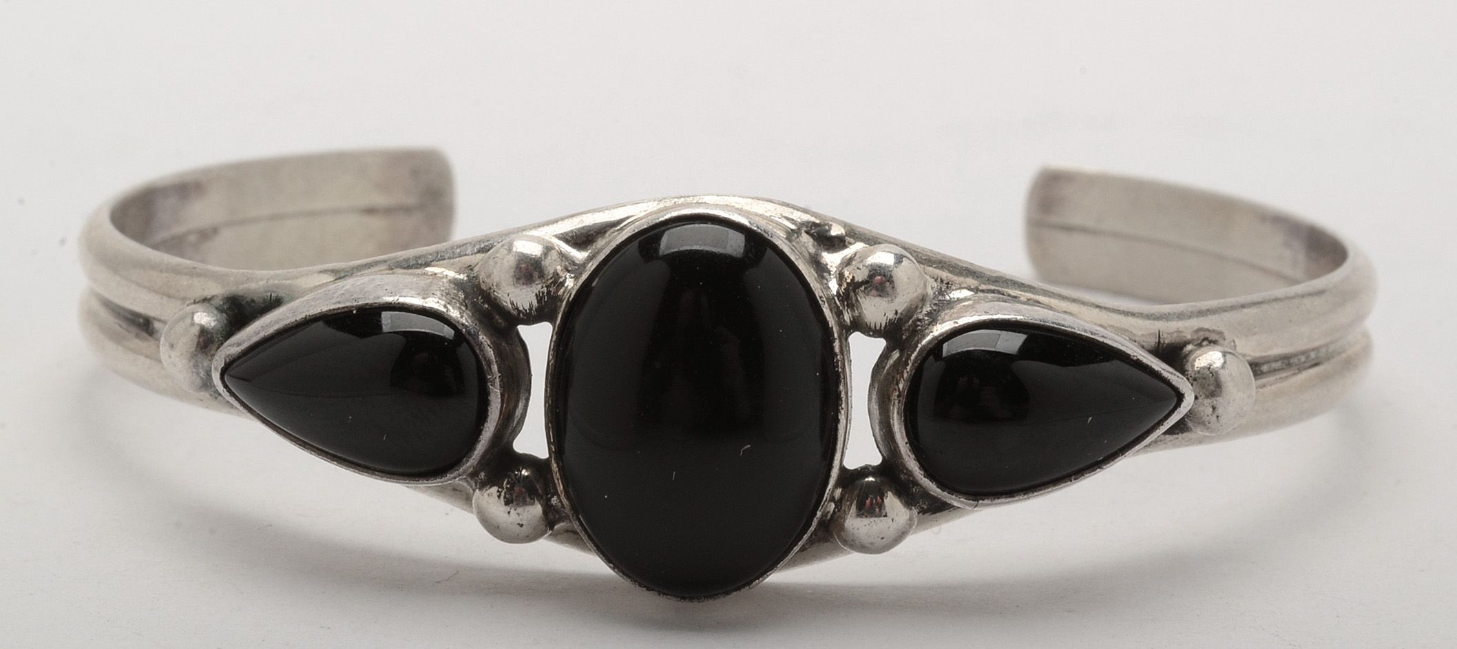 Pairing of Sterling Silver Bracelets Including Signed Pat Yazzie