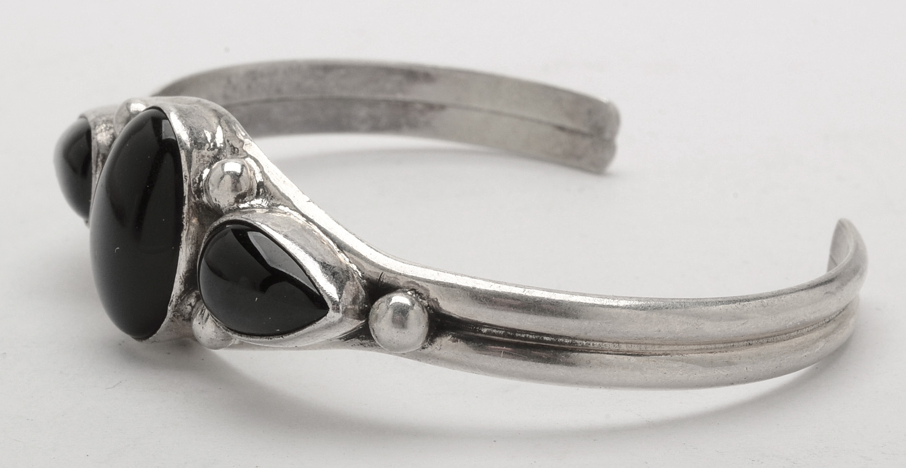 Pairing of Sterling Silver Bracelets Including Signed Pat Yazzie