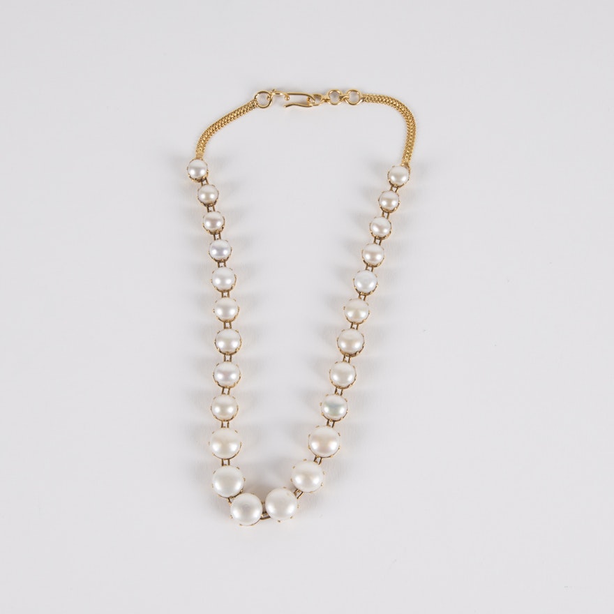 14K Gold and Graduated Button Pearl Necklace