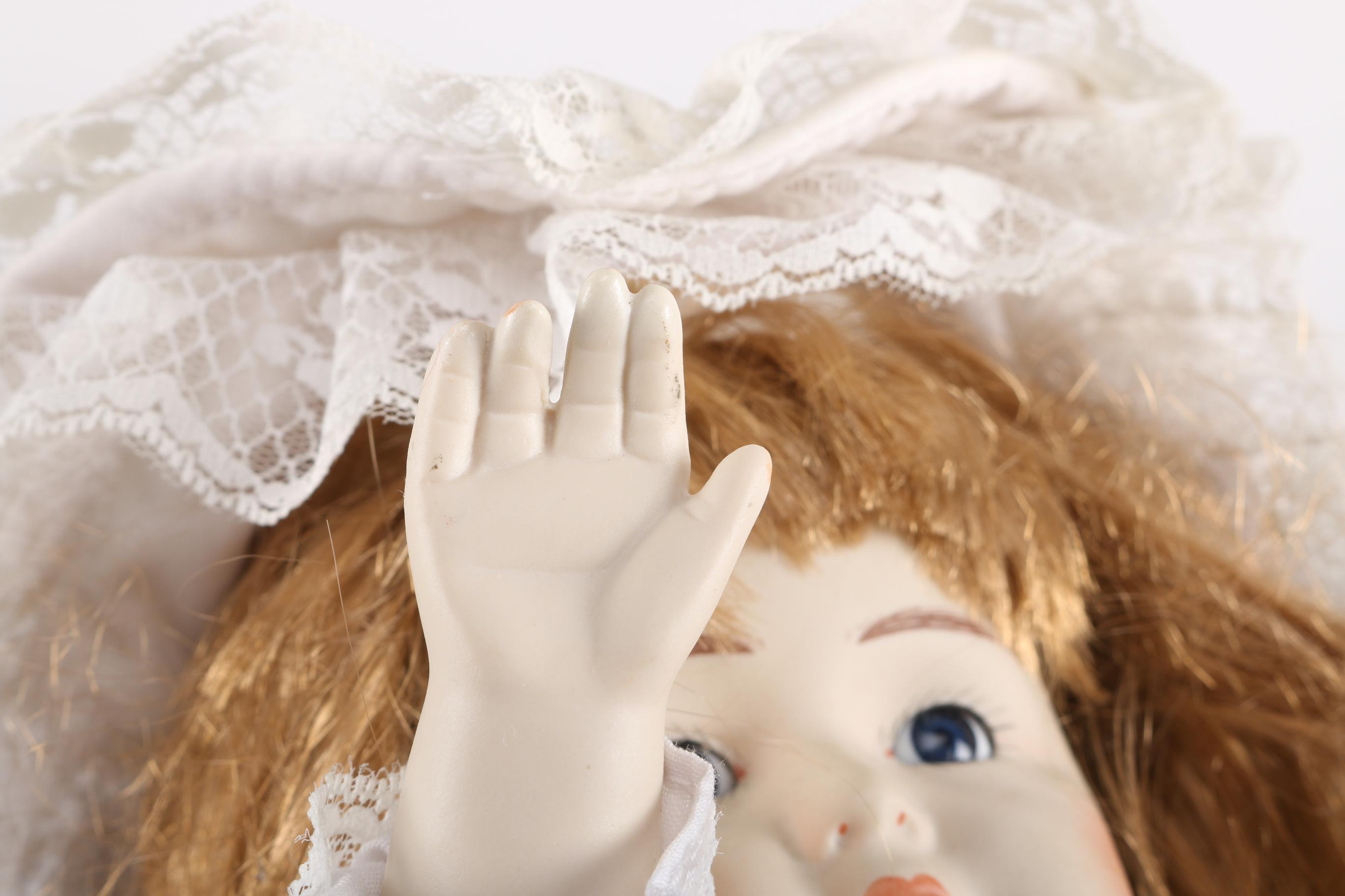 Musical Wind Up Porcelain Dolls