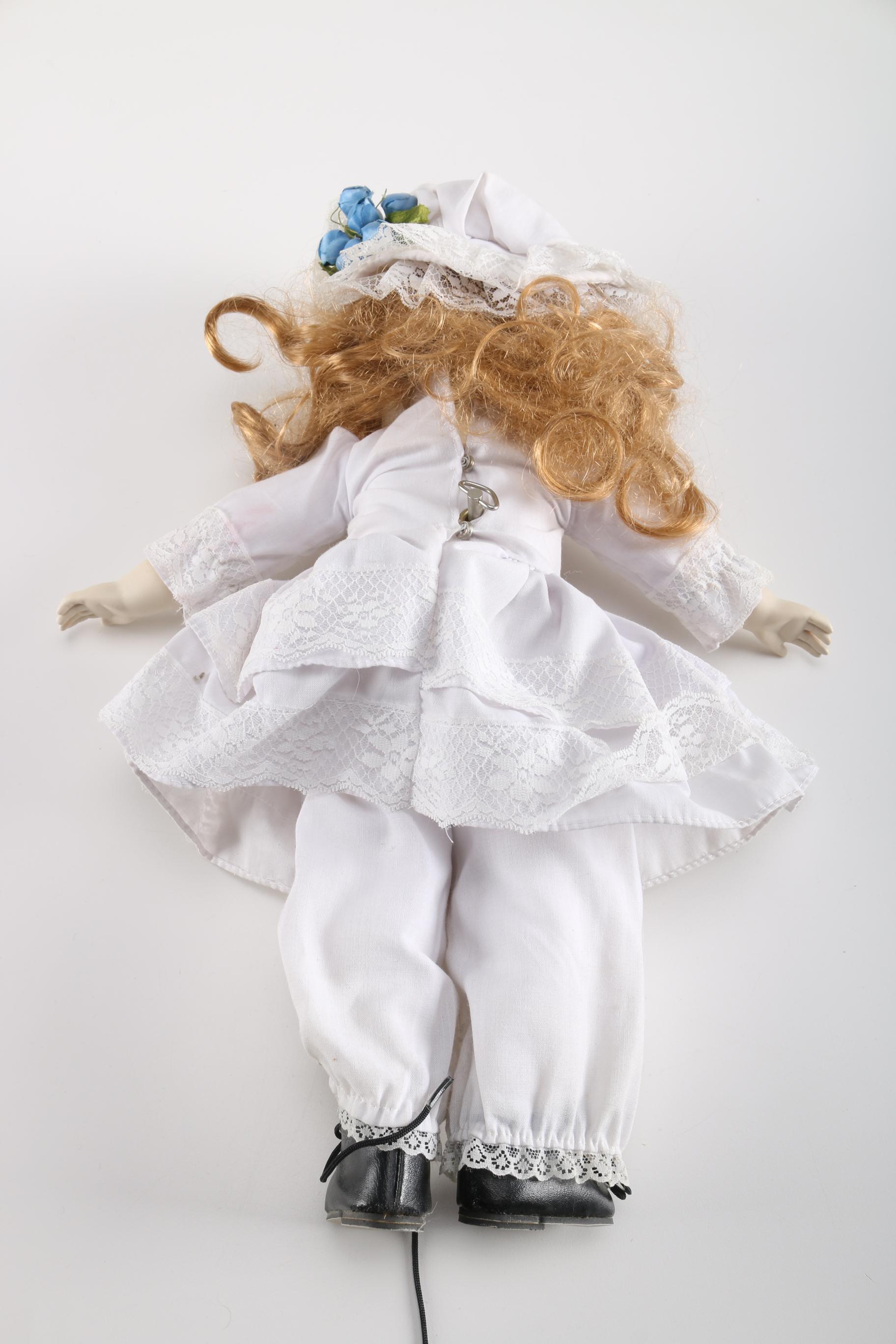 Musical Wind Up Porcelain Dolls
