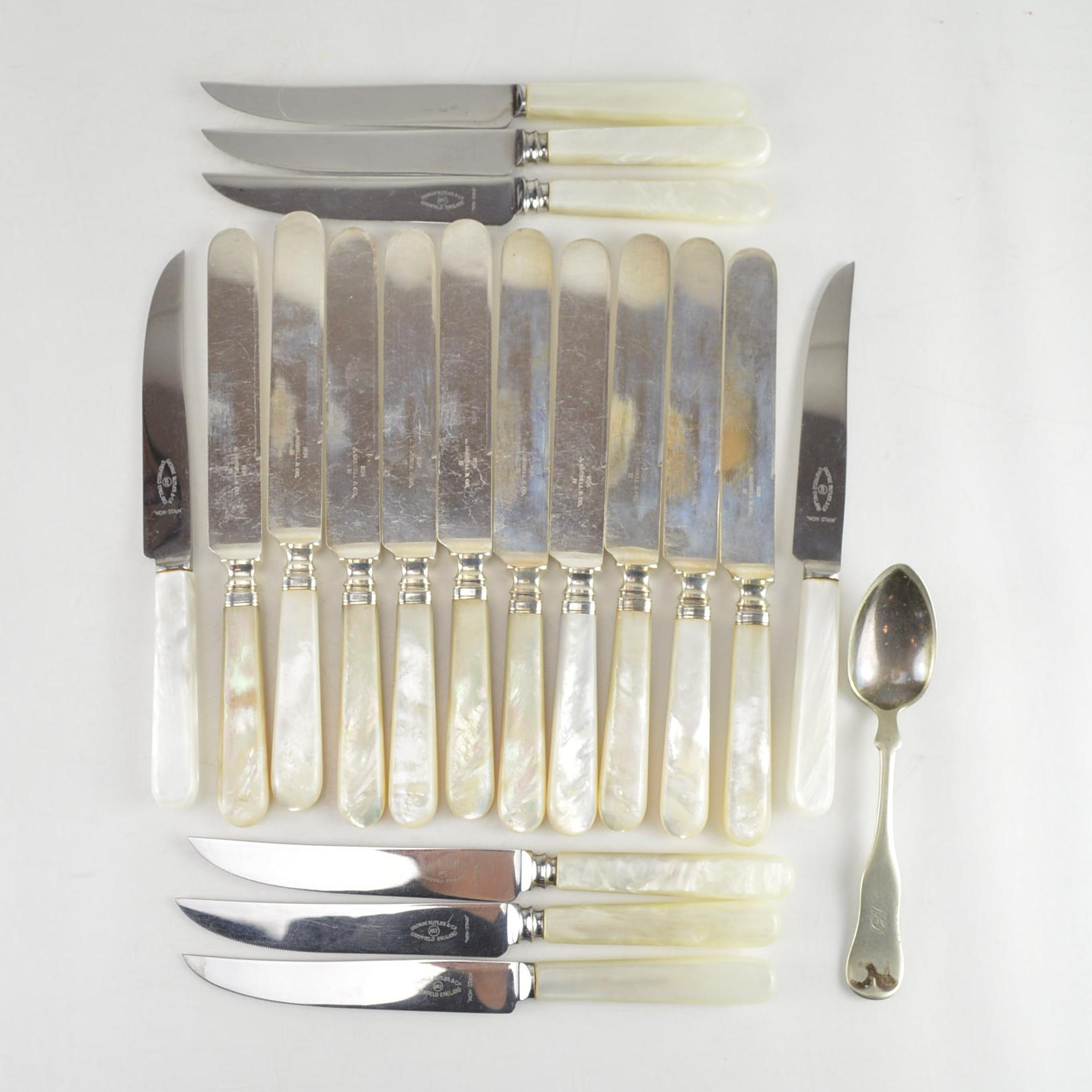 Mother of Pearl Handled Flatware and a Silver Plate Spoon